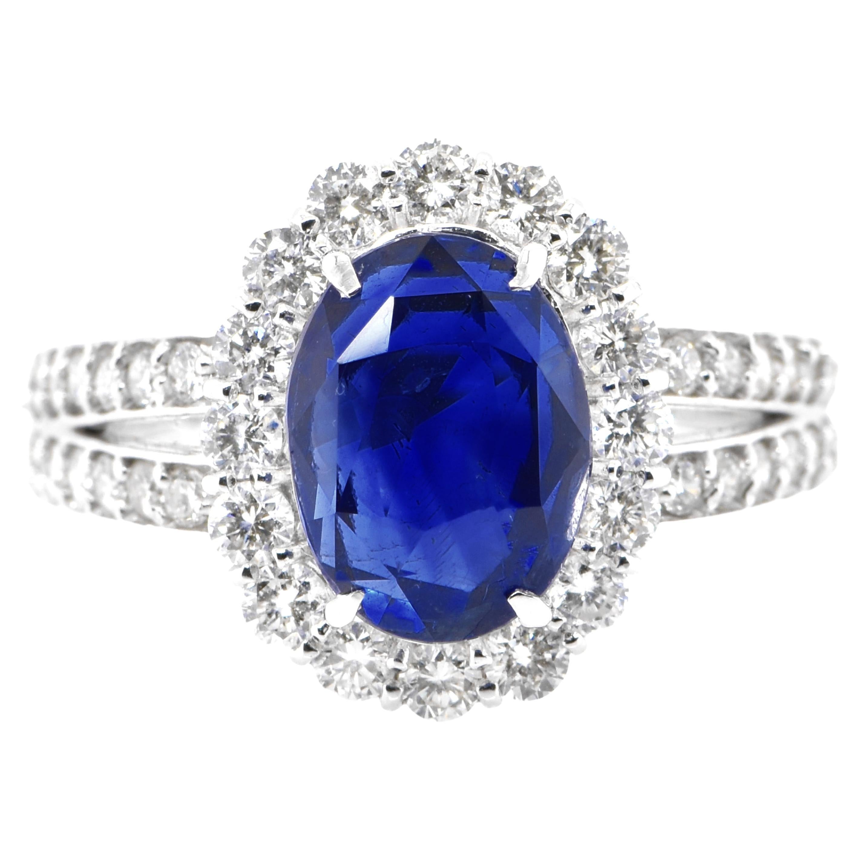 3.85 Carat Natural Sapphire and Diamond Halo Ring Set in Platinum