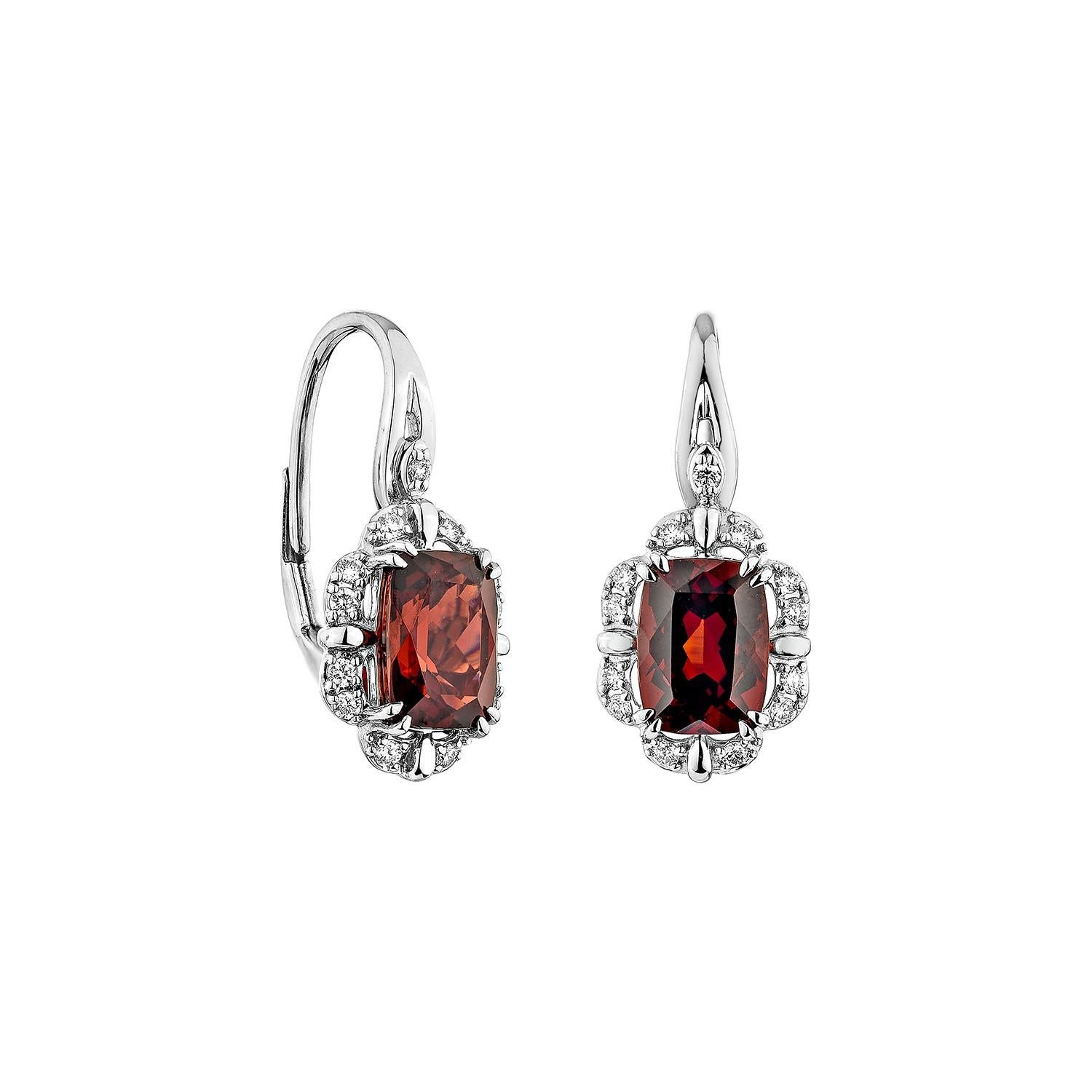Presented A lovely Drop Earrings of Garnet is perfect for people who want to wear it to any occasion or celebration. Its captivating garnet, and white diamond set in 14karat white gold, intended to charm hearts and elevate any special occasion.
