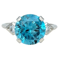 3.85 Carat Round Cut Blue Zircon Ring with Diamond Accents in Polished Platinum