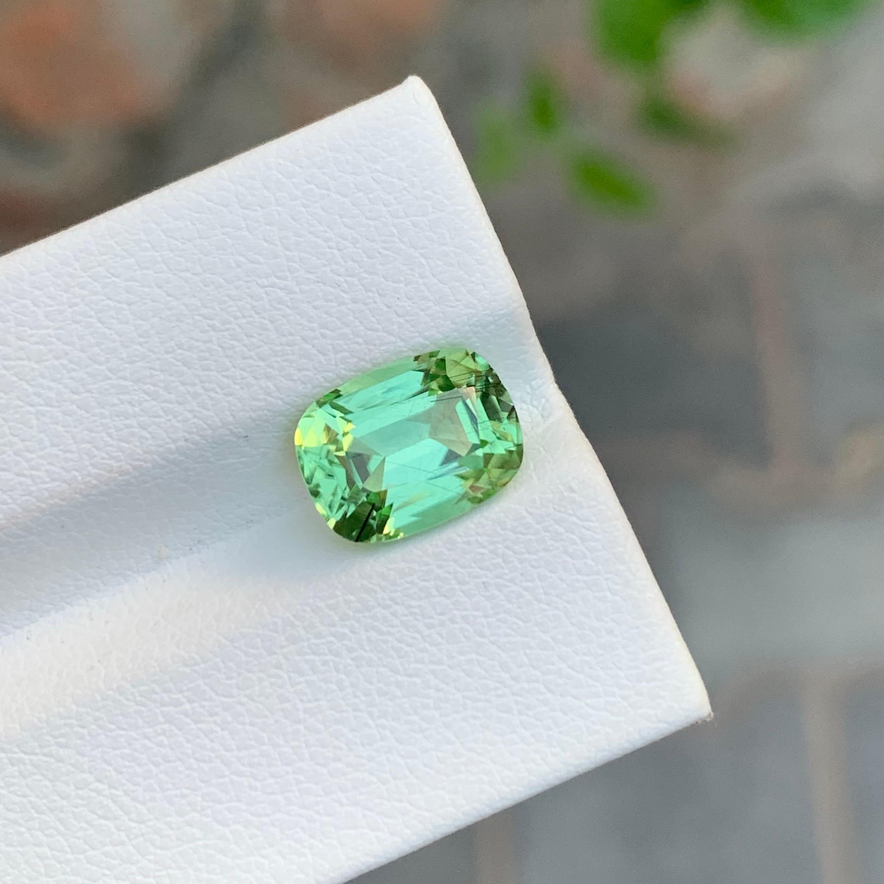 Loose Rutile Peridot
Weight: 3.85 Carats
Dimension: 10.7 x 8 x 5.8 Mm
Colour: Green
Origin: Supat Valley, Pakistan
Shape: Cushion 
Certificate: On Demand
Treatment: Non

Peridot, a vibrant and lustrous gemstone, has been cherished for centuries for