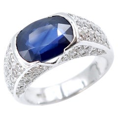 3.85 Carat Velvety Blue Sapphire Pavé Diamond Vacant Sides 18k White Gold Ring