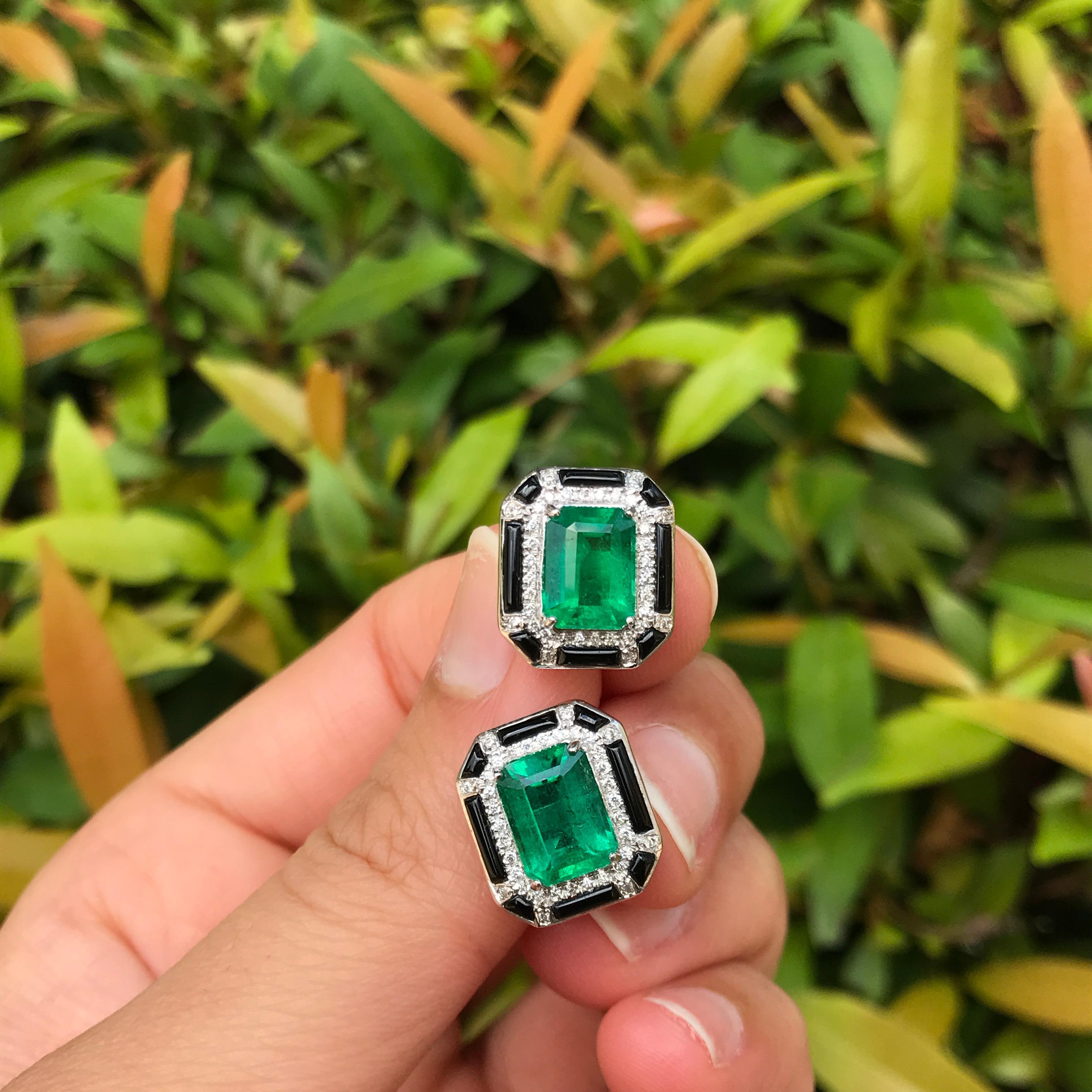 A beautiful pair of art-deco looking 3.85 carat lustrous Zambian Emerald of top quality and color, and Diamond studs with black onyx, all set in 18K White Gold. Push and pull backing included. 

Material Details: 

Stone: Zambian Emerald 
Weight: