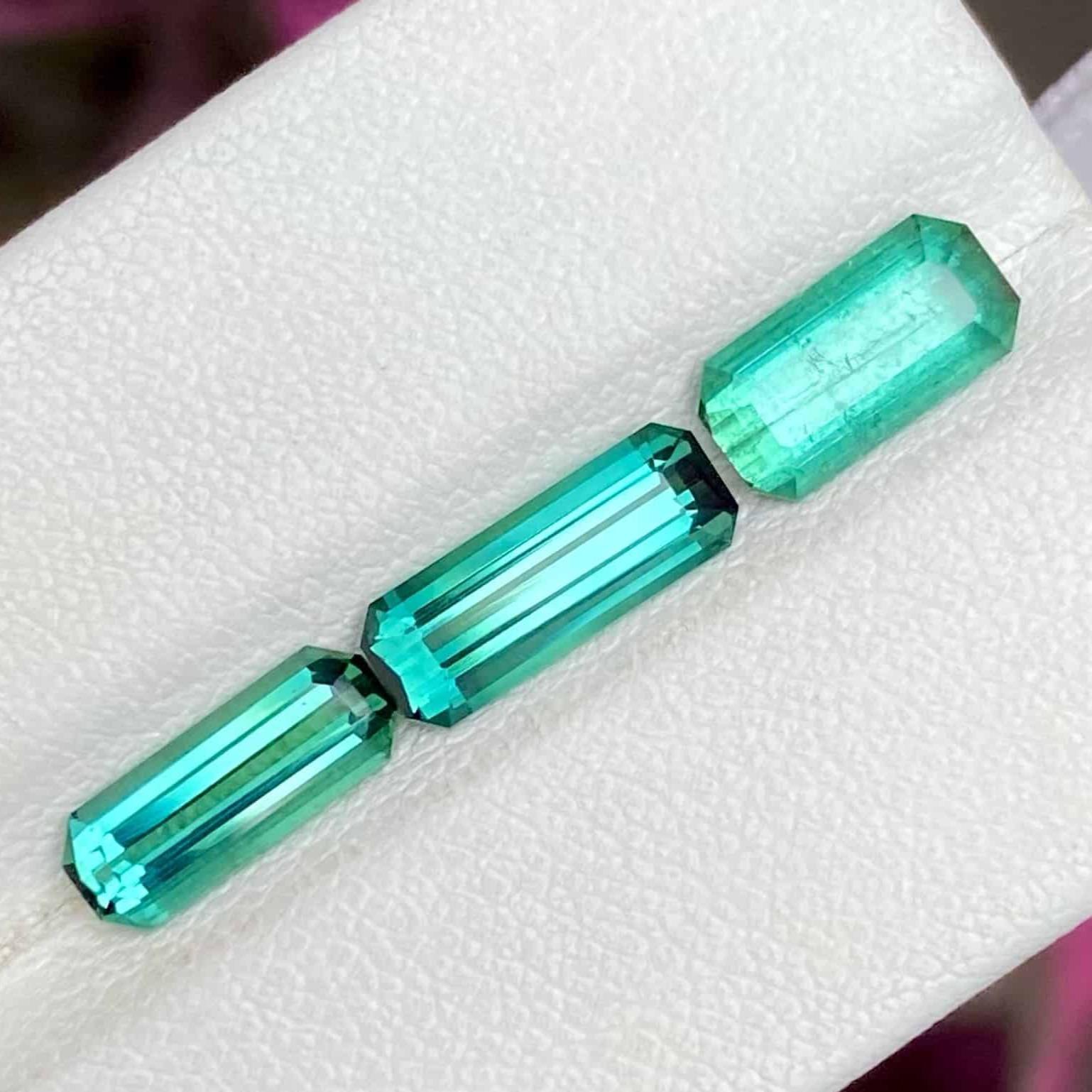 Gemstone Type Greenish Blue Tourmaline Lot
Weight 3.85 carats
Weight (Left) 1.30 carat
Weight (Middle) 1.45 carat
Weight (Right)	1.15 carat
Clarity SI to Eye Clean
Origin Afghanistan
Treatment None





Indulge in the enchanting allure of this