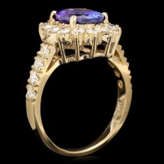 3.85 Carat Natural Tanzanite and Diamond 14 Karat Solid Yellow Gold Ring