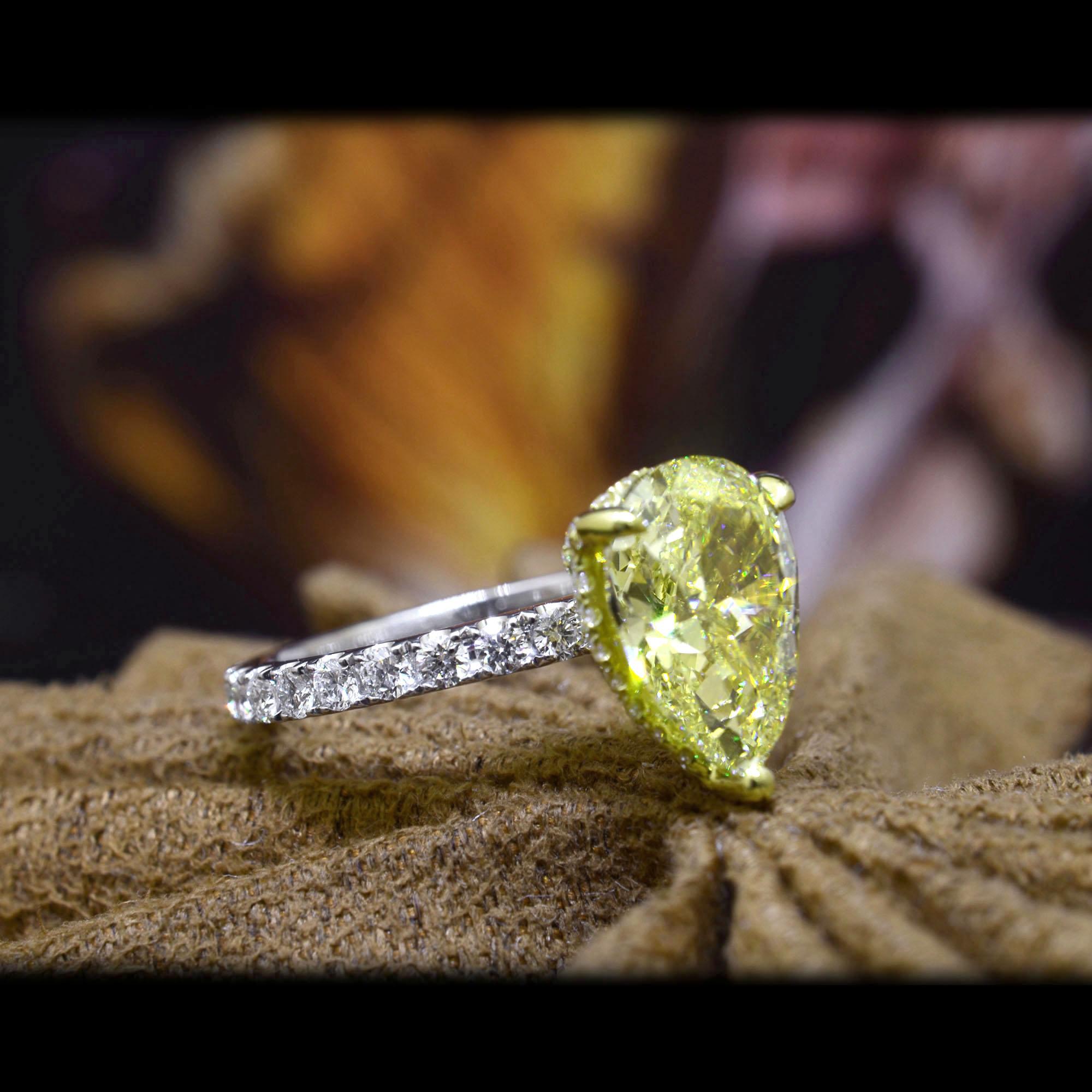 Modern 3.85 Ct Canary Fancy Light Yellow Pear Shaped Hidden Halo Engagement Ring VVS1 For Sale