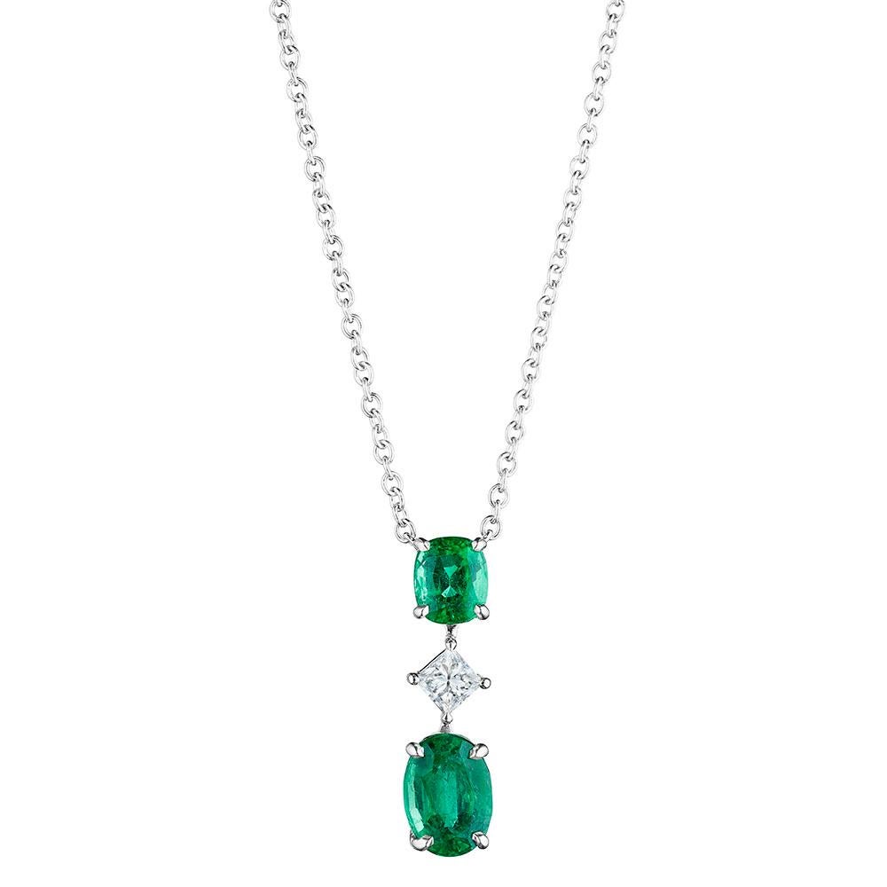 •	18KT White
•	Carat Weight: 3.85 Carats

•	Number of Princess Cut Diamonds: 1
•	Carat Weight: 0.40ctw

•	Number of Oval Emeralds: 1
•	Carat Weight: 2.19ctw

•	Number of Cushion Emeralds: 1
•	Carat Weight: 1.26ctw

•	This 3 stone pendant hangs from
