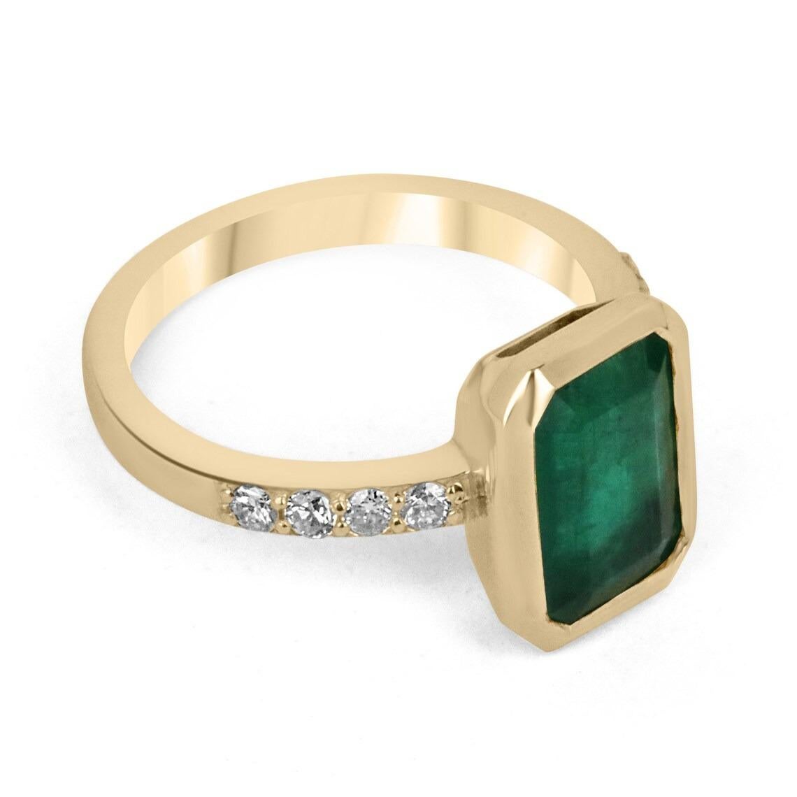 A remarkable emerald and diamond engagement ring. The center stone showcases a striking natural Zambian emerald with superior characteristics such as its deep green color, very good luster, and clarity. Natural internal inclusions are common in all