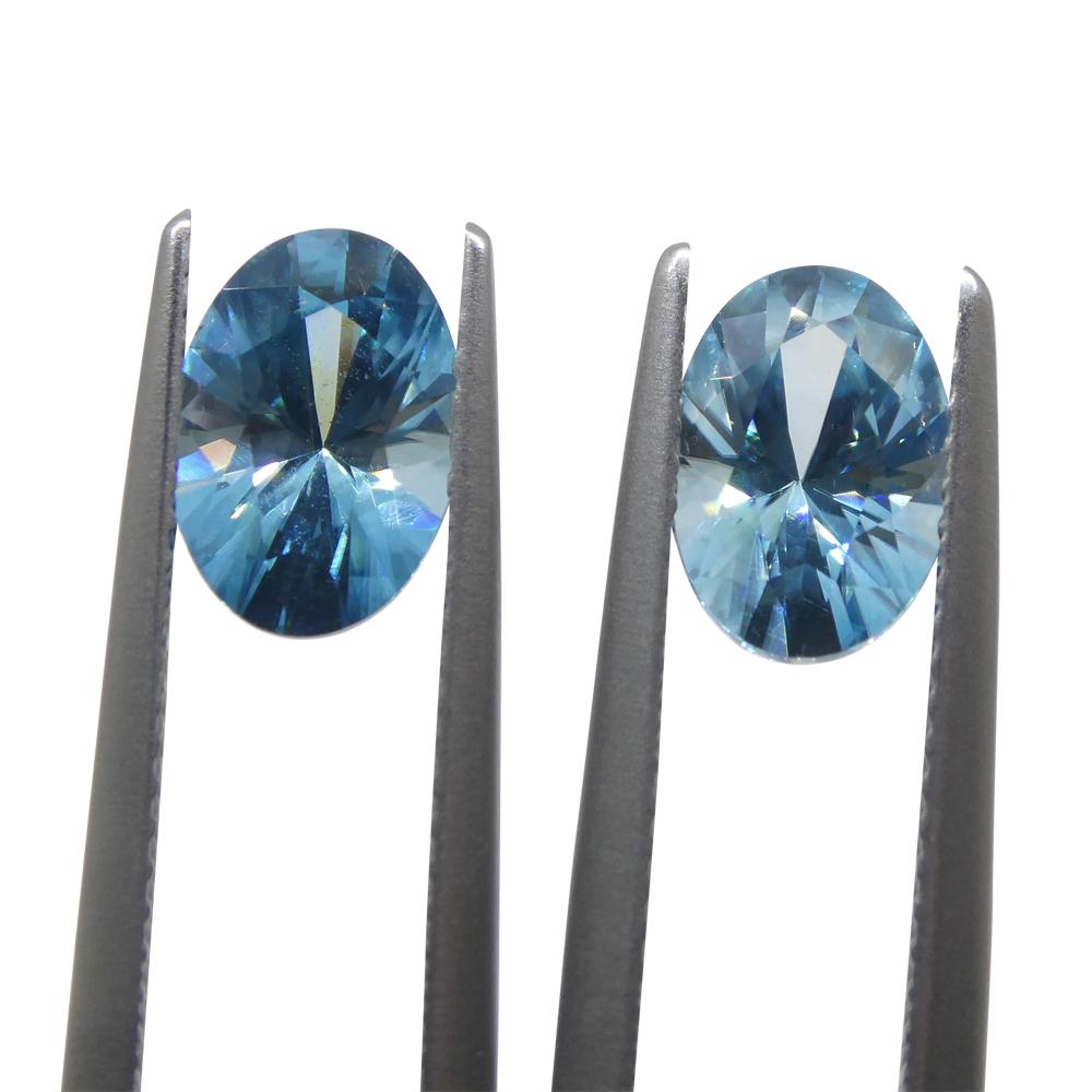 Brilliant Cut 3.86ct Pair Oval Diamond Cut Blue Zircon from Cambodia For Sale