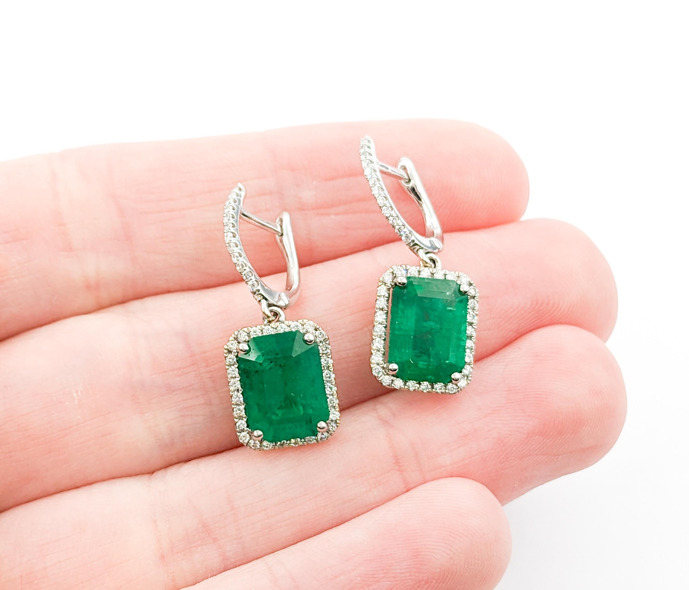 3.86ctw Emerald & Diamond Dangle Earrings In White Gold


These exquisite earrings, crafted in 18kt white gold, showcase .32ctw diamonds paired with stunning 3.86ctw GIA-certified emeralds in a dangle halo design. The diamonds, boasting I clarity,