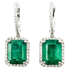 3.86ctw Emerald & Diamond Dangle Earrings In White Gold