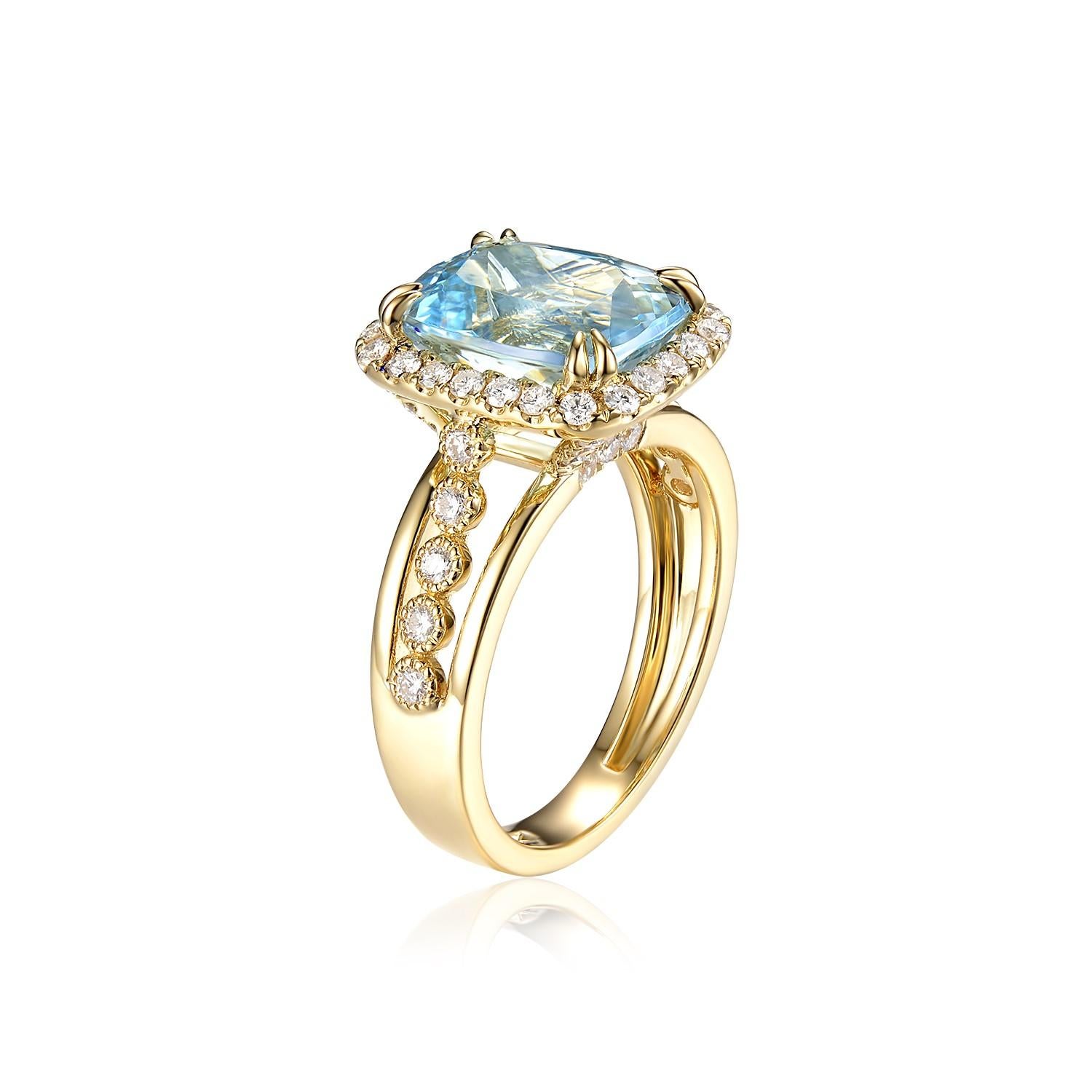 This stunning piece features 3.87 carats of cushion cut aquamarine in the center. The main stone is assented with a diamond halo. A classic yet modern design. 

18 Karat Yellow Gold
Aquamarine 3.87 Carats
White Round Diamonds 0.54 carats