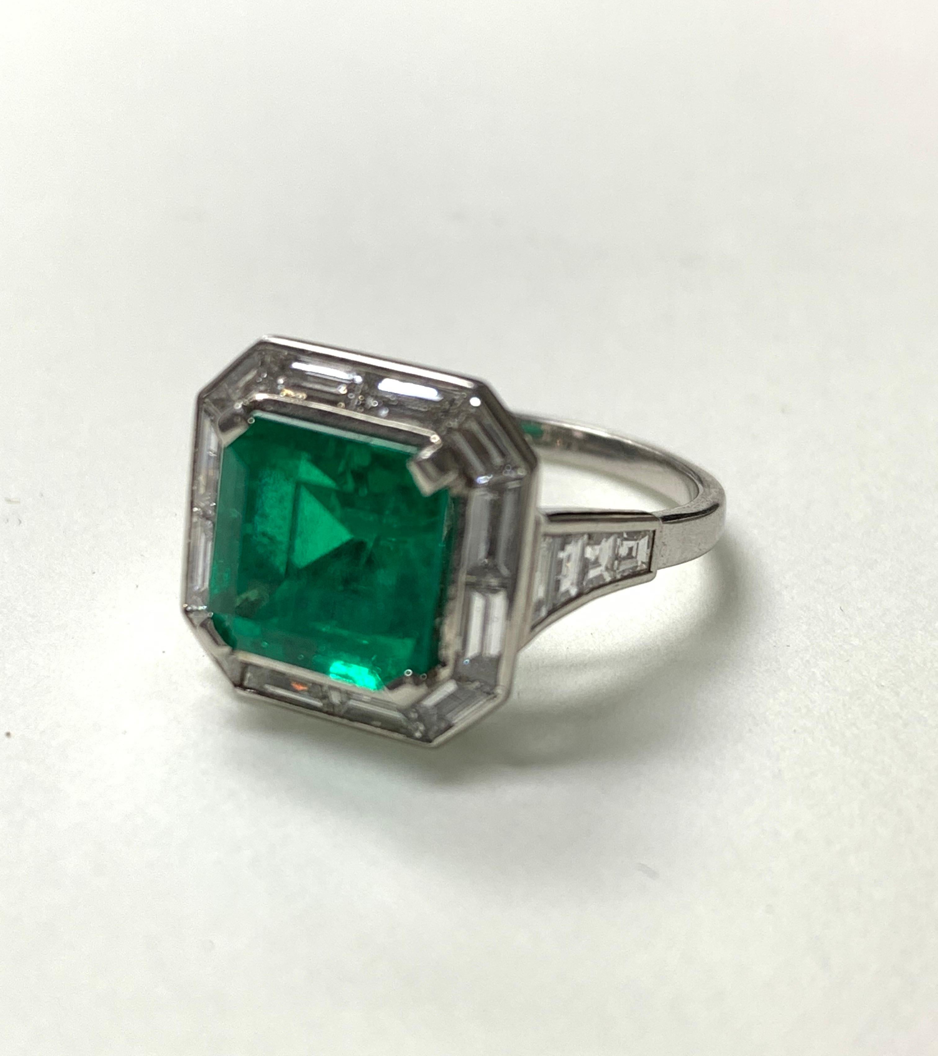 Contemporary 3.87 Carat Emerald and Diamond Ring in Platinum For Sale