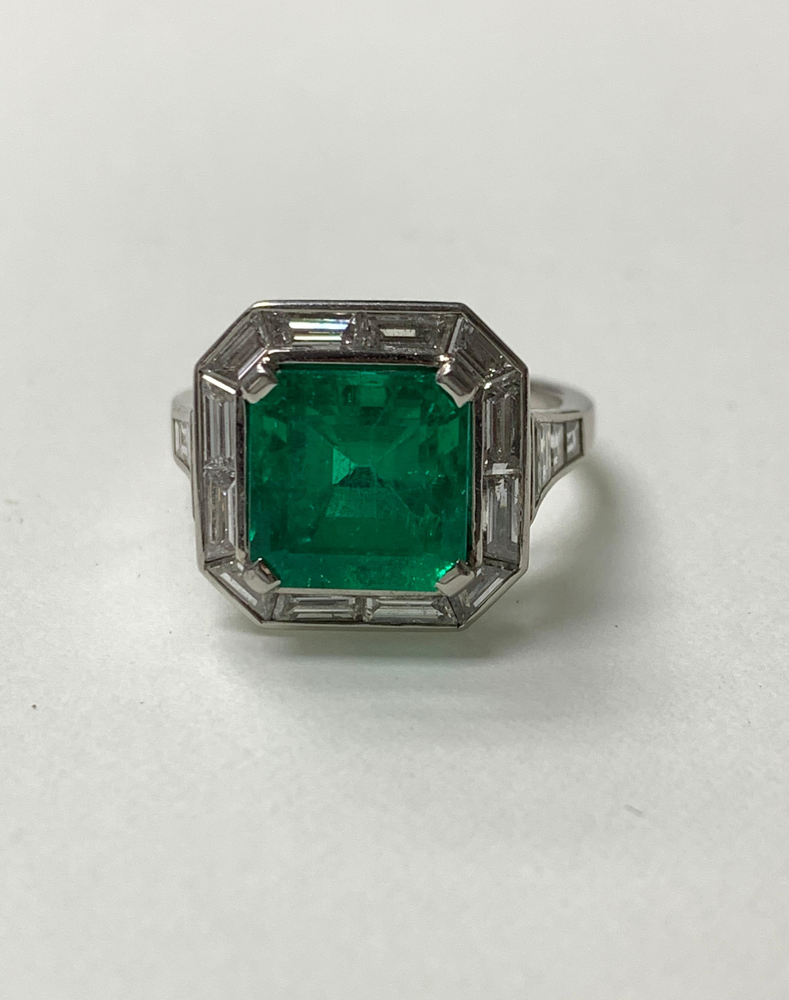 Women's 3.87 Carat Emerald and Diamond Ring in Platinum For Sale