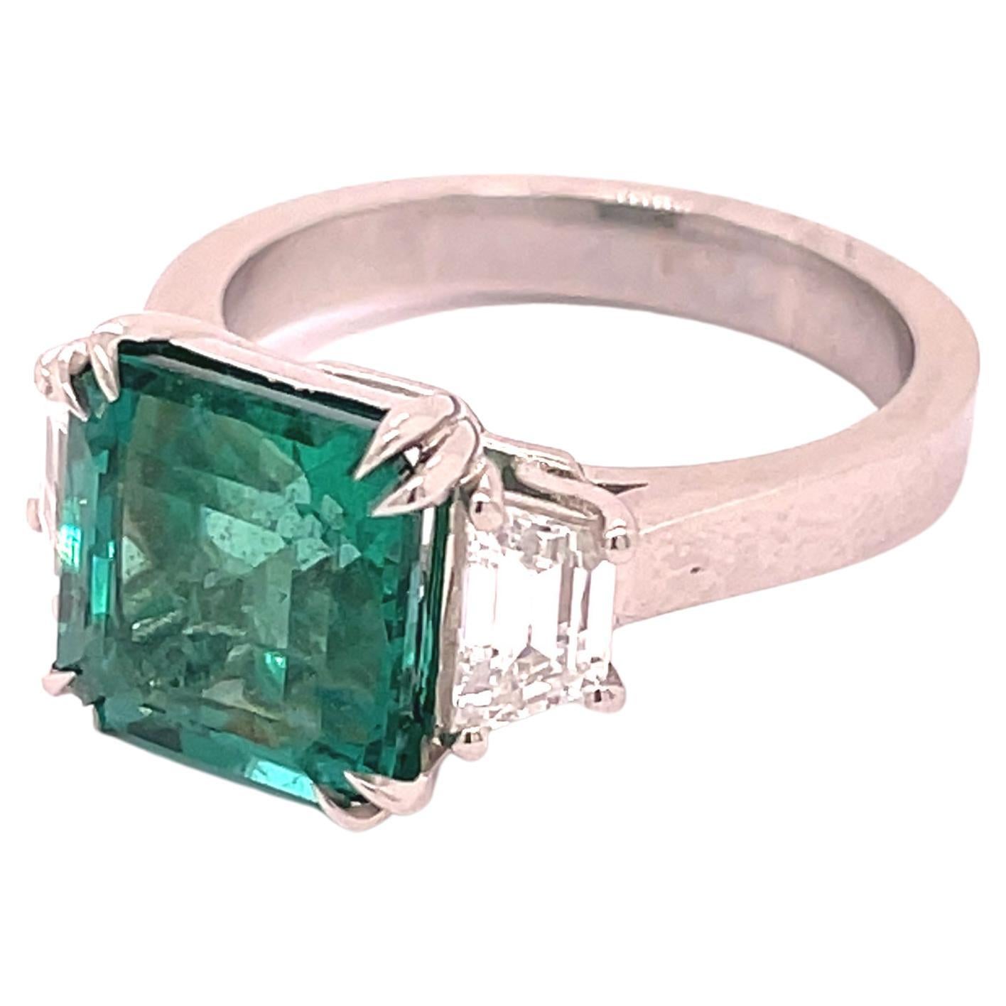 emerald with trapezoid side stones