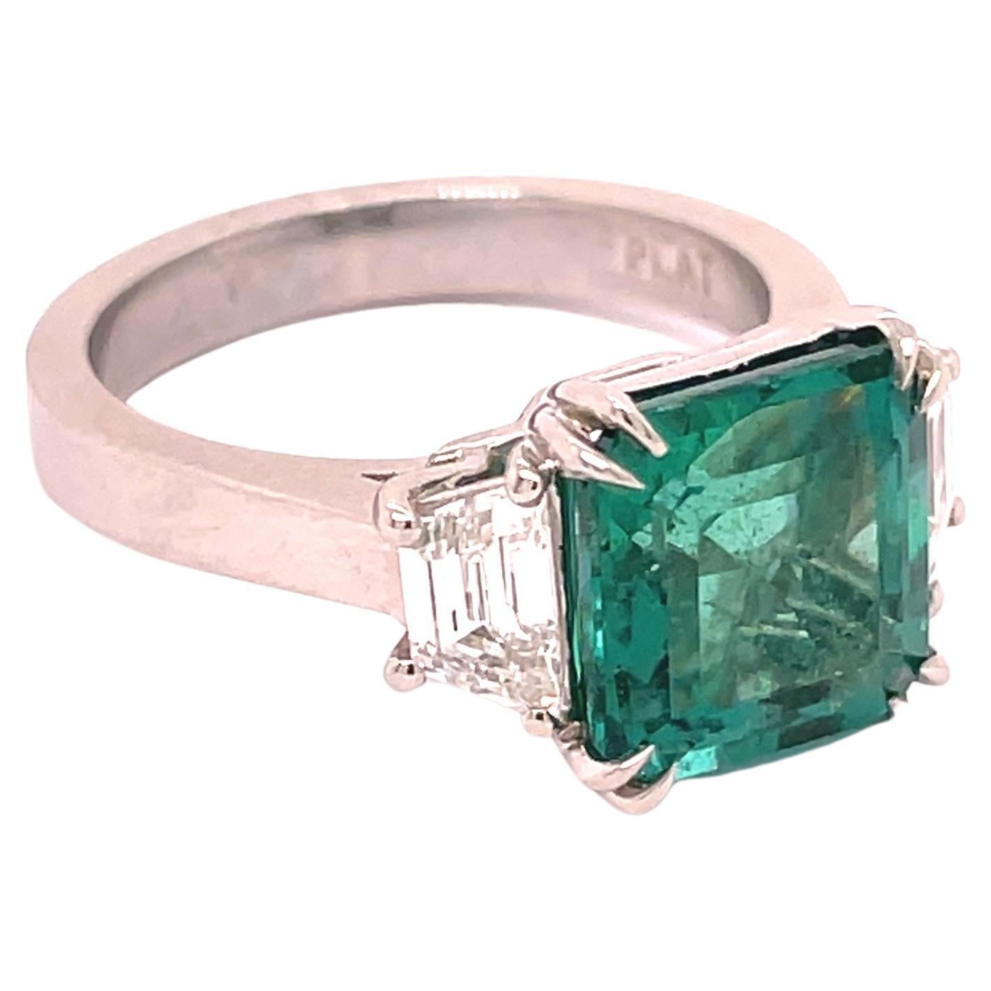 3.87 Carat Natural Emerald Radiant Cut 3 Stone Ring W/ Trapezoid Side Stones  In New Condition For Sale In LA, CA