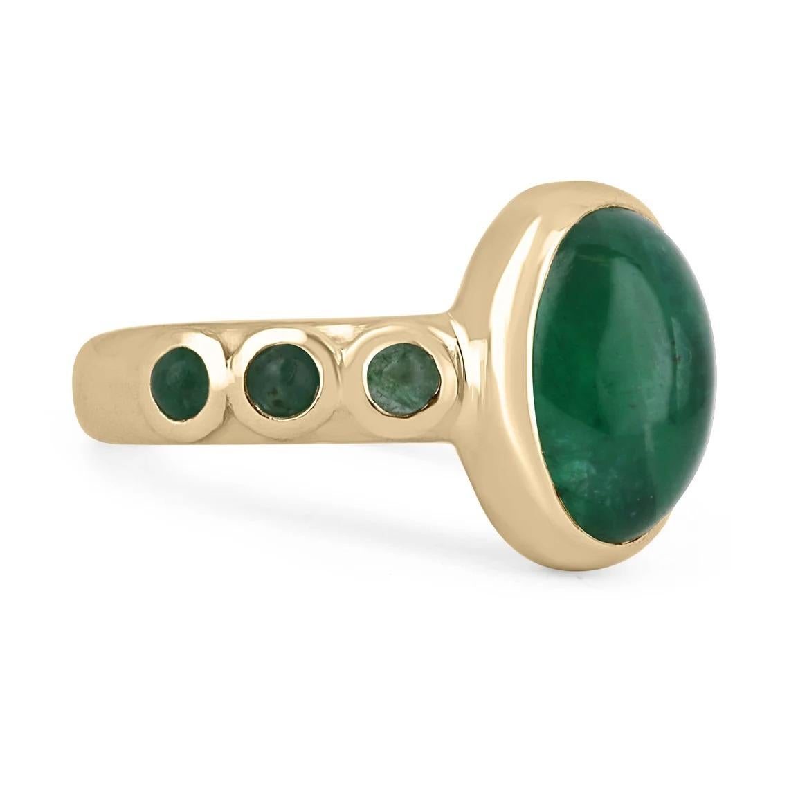 Featured is a stunning natural emerald cabochon unisex ring. This one-of-a-kind piece features a large 4.54-carat oval cut emerald cabochon as the center stone. It displays many good qualities and a lush medium-dark green color. Accenting the center