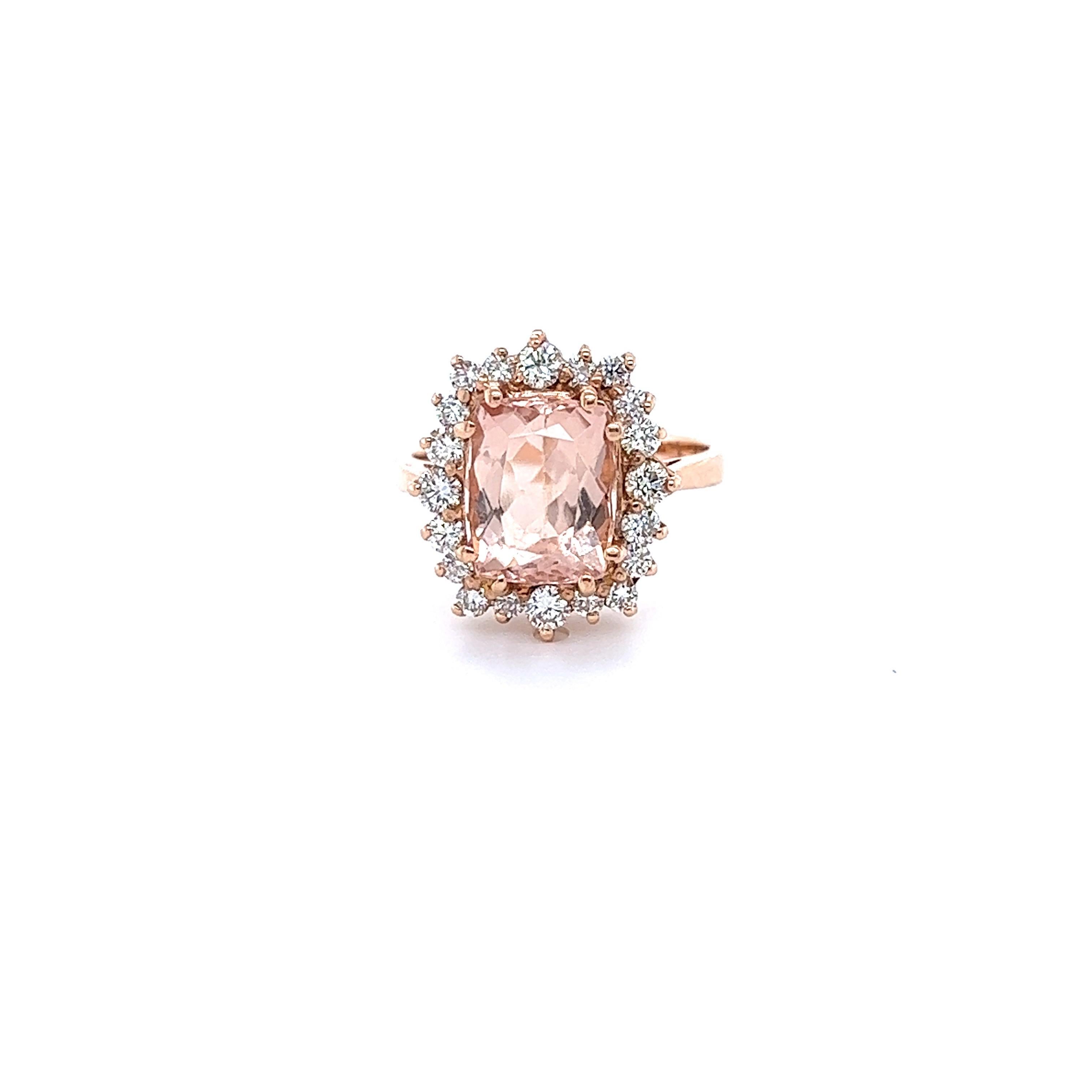 
This Morganite Diamond Ring has a 3.16 Carat Emerald Cushion Cut Peach Morganite and is surrounded by 20 Round Cut Diamonds that weigh 0.72 carats. (Clarity: VS, Color: H) The Total Carat Weight of the ring is 3.88 Carats.  

The morganite measures