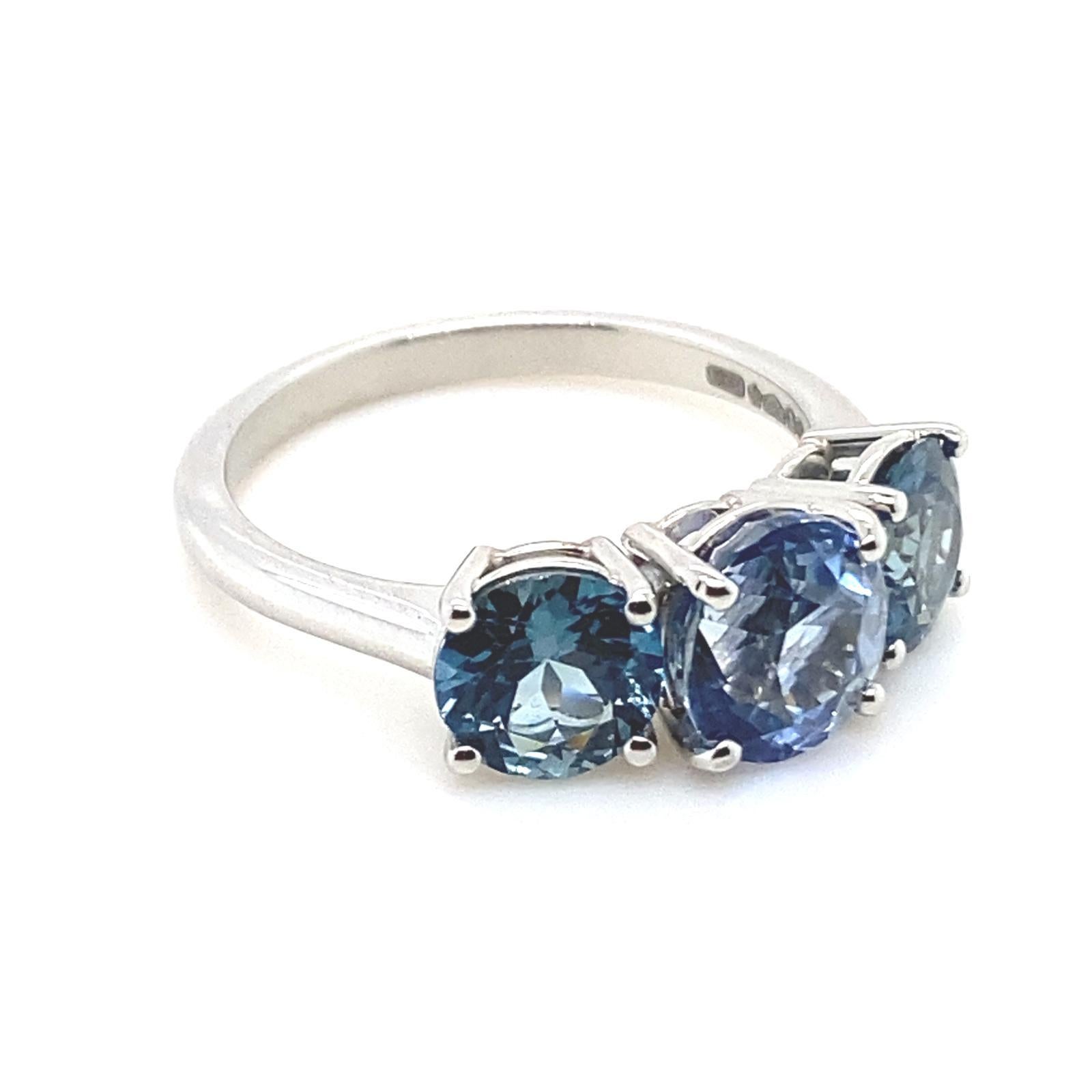 Modern 3.88 Carat Sapphire Three Stone Platinum Engagement Ring For Sale