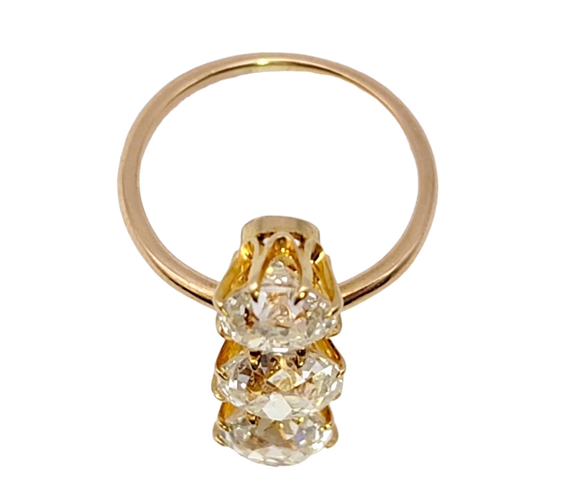 3.88 Carat Total Three-Stone Old Mine Cut Diamond Elongated 14 Karat Gold Ring For Sale 1