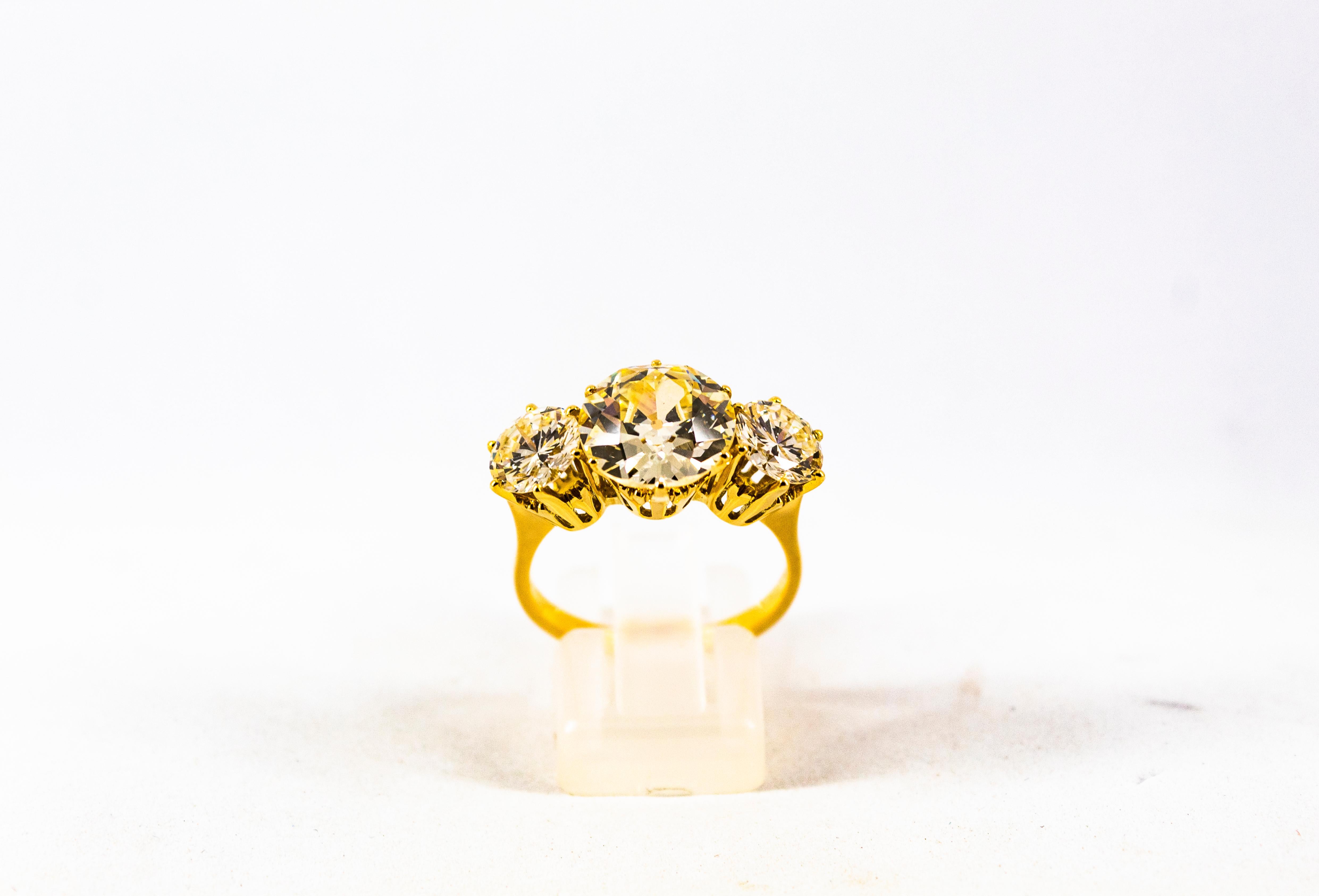 Art Deco 3.88 Carat White Diamond 2.04 Carat White Diamond Yellow Gold Trilogy Ring