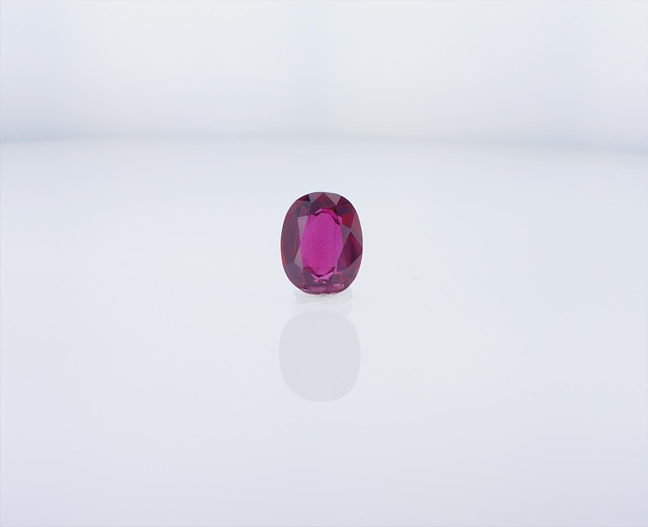 3.89 Carat Thai Oval Ruby, GIA Report 6173102771. 10.97 x 8.75 x 4.19mm. Natural, heated, red. 