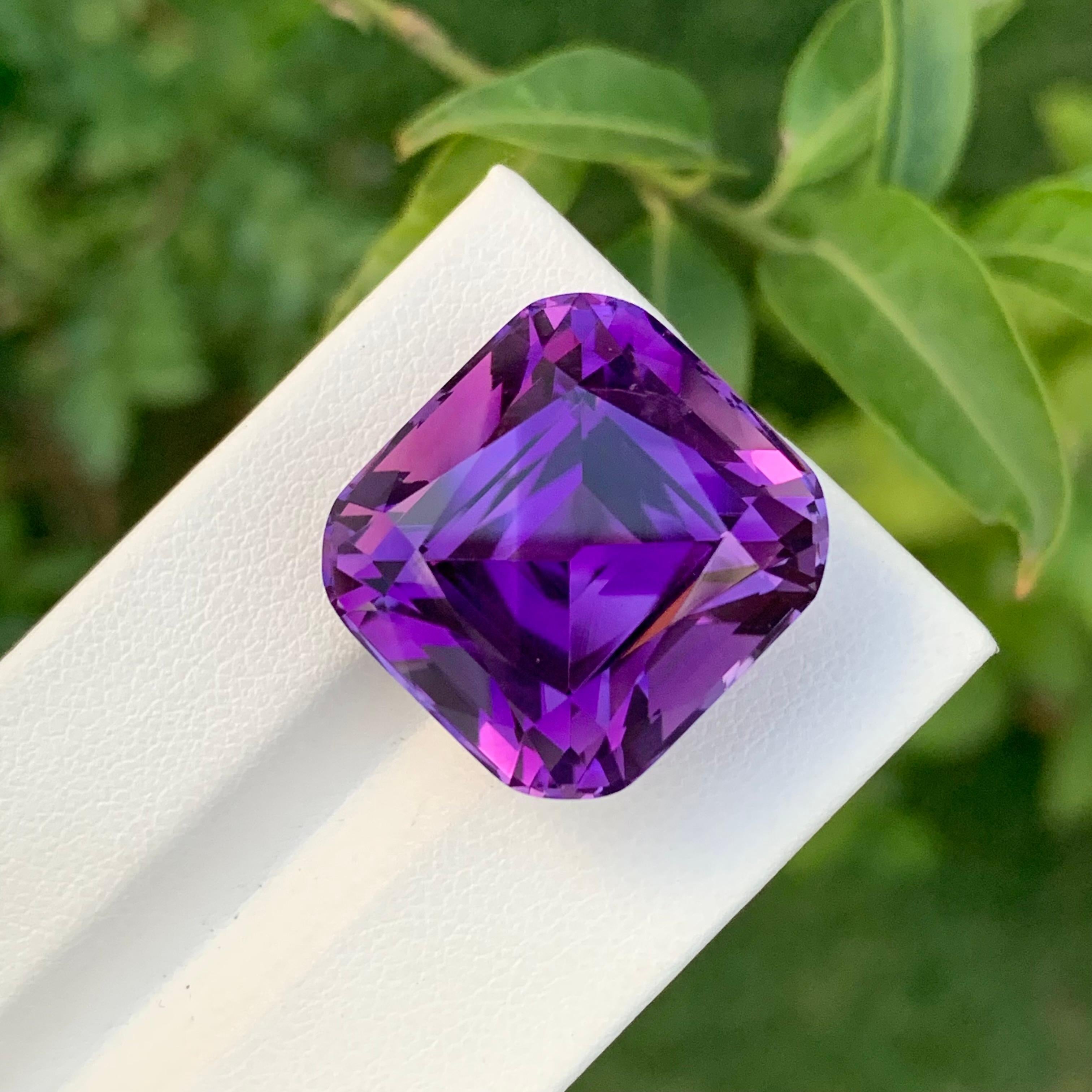 Loose Amethyst
Weight: 38.90 Carats
Dimension: 20 x 19 x 15.7 Mm
Colour: Purple
Origin: Brazil
Treatment: Non
Certificate: On Demand
Shape: Cushion

Amethyst, a stunning variety of quartz known for its mesmerizing purple hue, has captivated humans