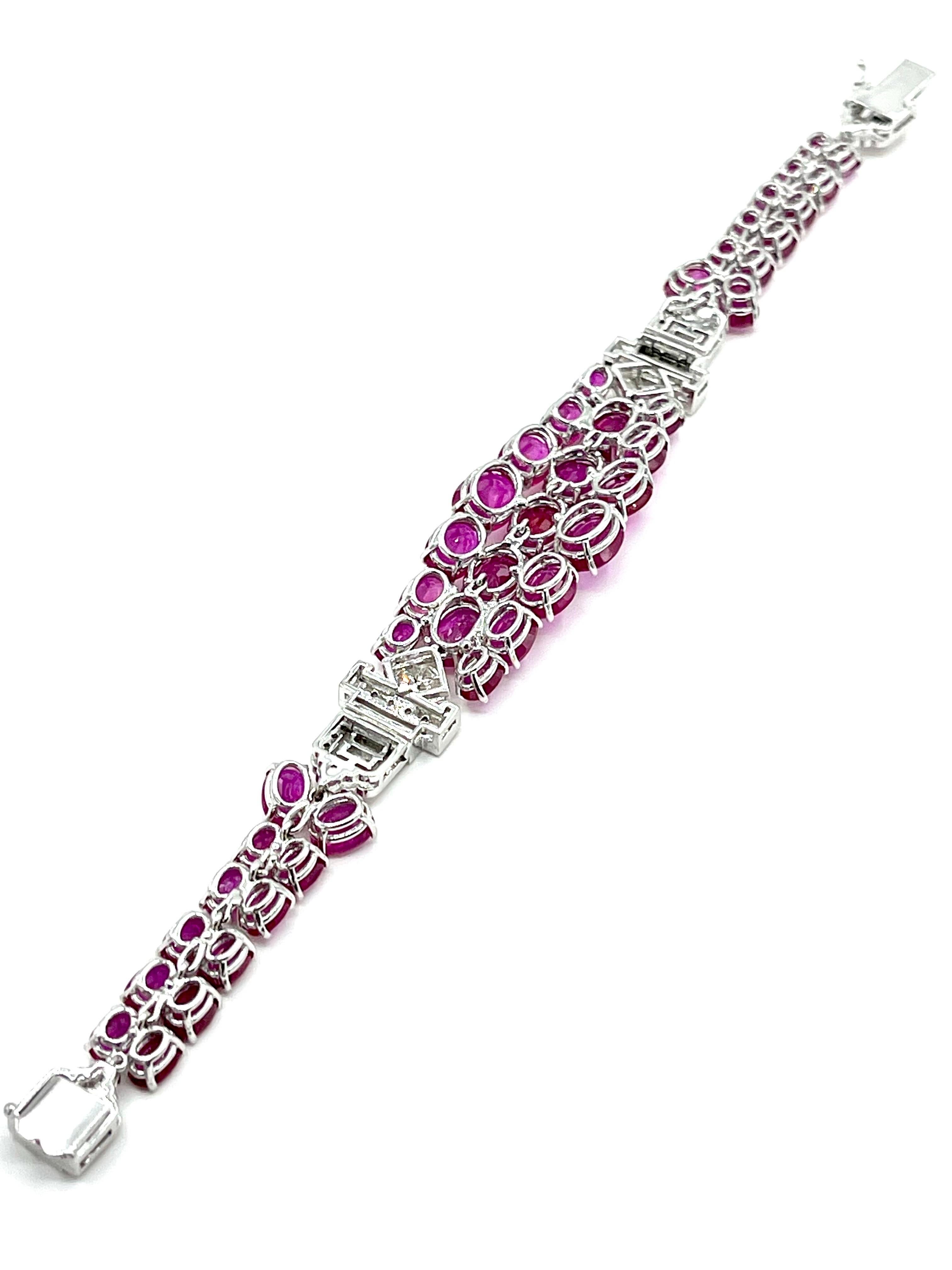 38.90 Carat Oval Ruby and Diamond Deco Style Bracelet In Excellent Condition In Chevy Chase, MD