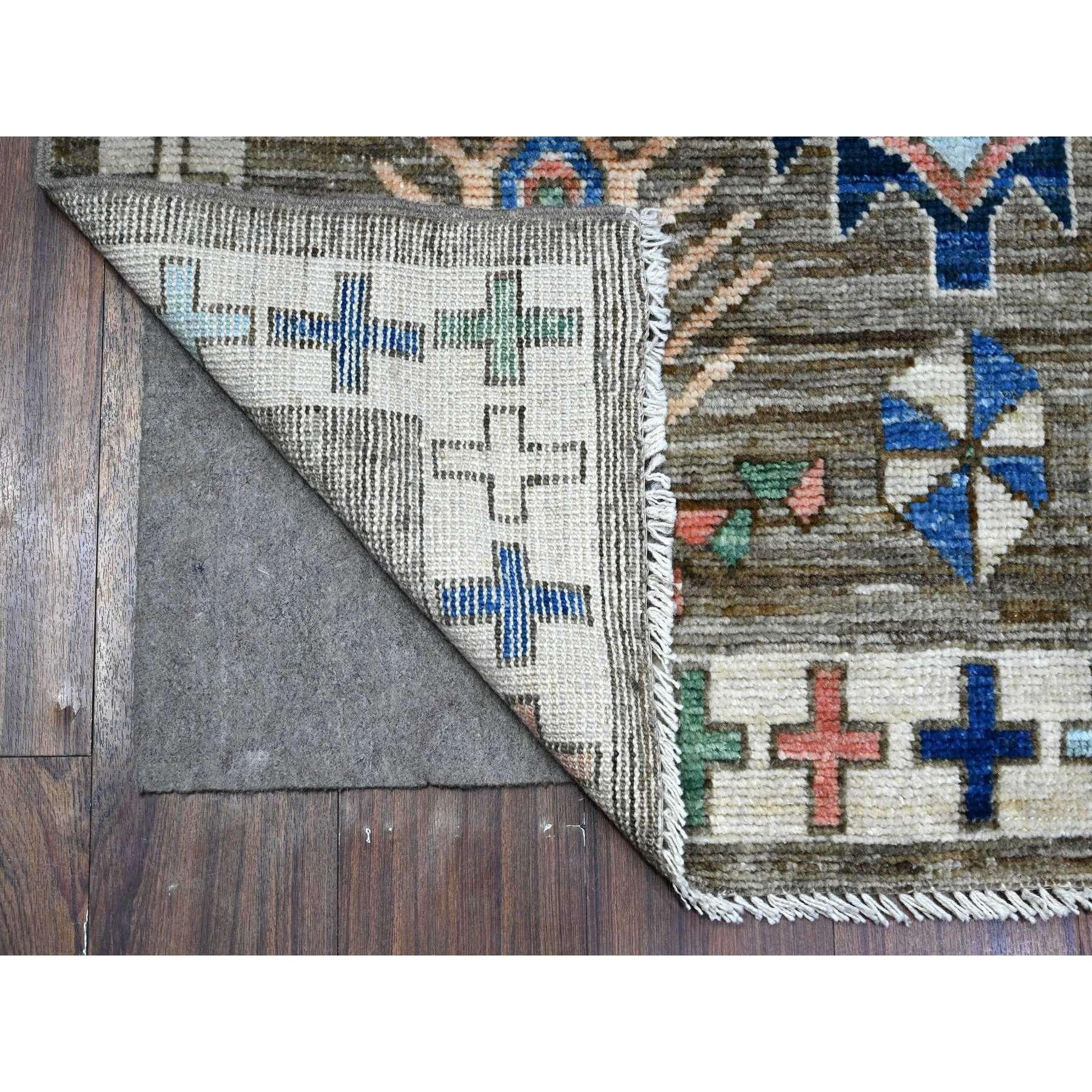 This is a truly genuine one-of-a-kind Anatolian Village Inspired, Hand Knotted, Pure Wool, Oriental Rug. It has been Knotted for months and months in the centuries-old weaving craftsmanship techniques by expert artisans.
Primary materials: