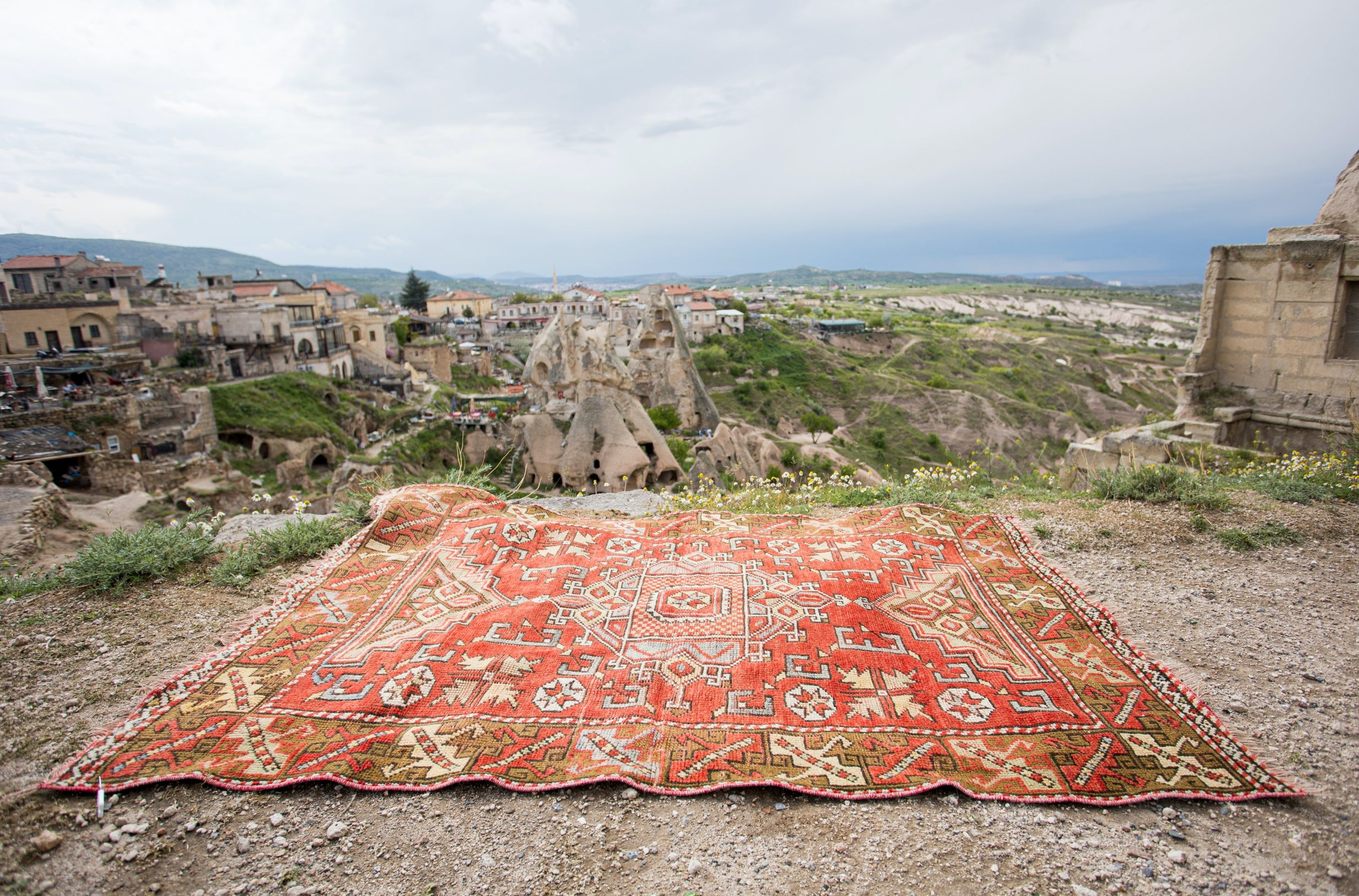 A finely hand-knotted vintage Turkish rug from 1960s. The rug is made of medium wool pile on wool foundation. It is heavy and lays flat on the floor, in very good condition with no issues. It has been washed professionally, the rug is sturdy and can