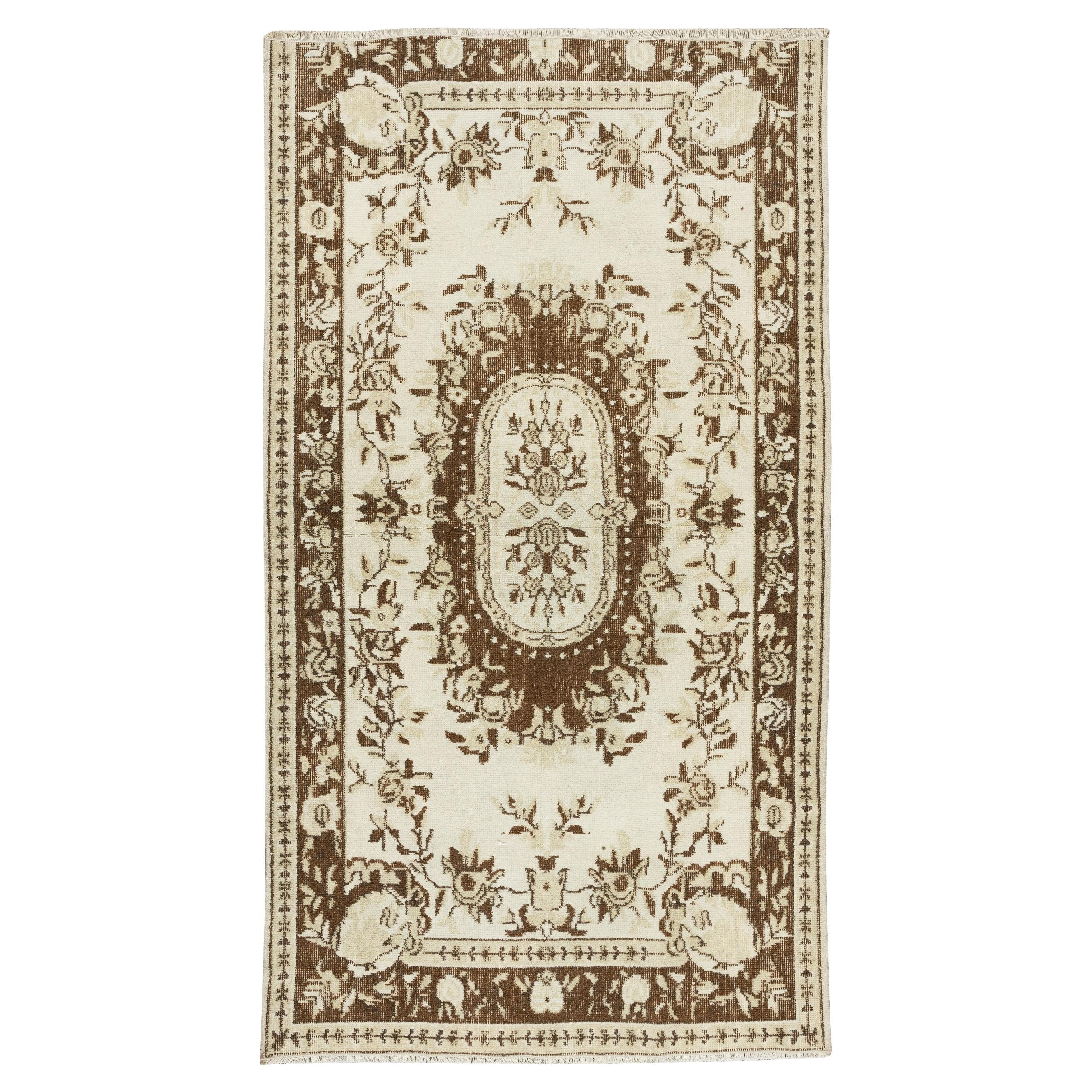 Hand Knotted Vintage Turkish Sun Faded Wool Rug with Aubusson Style For Sale