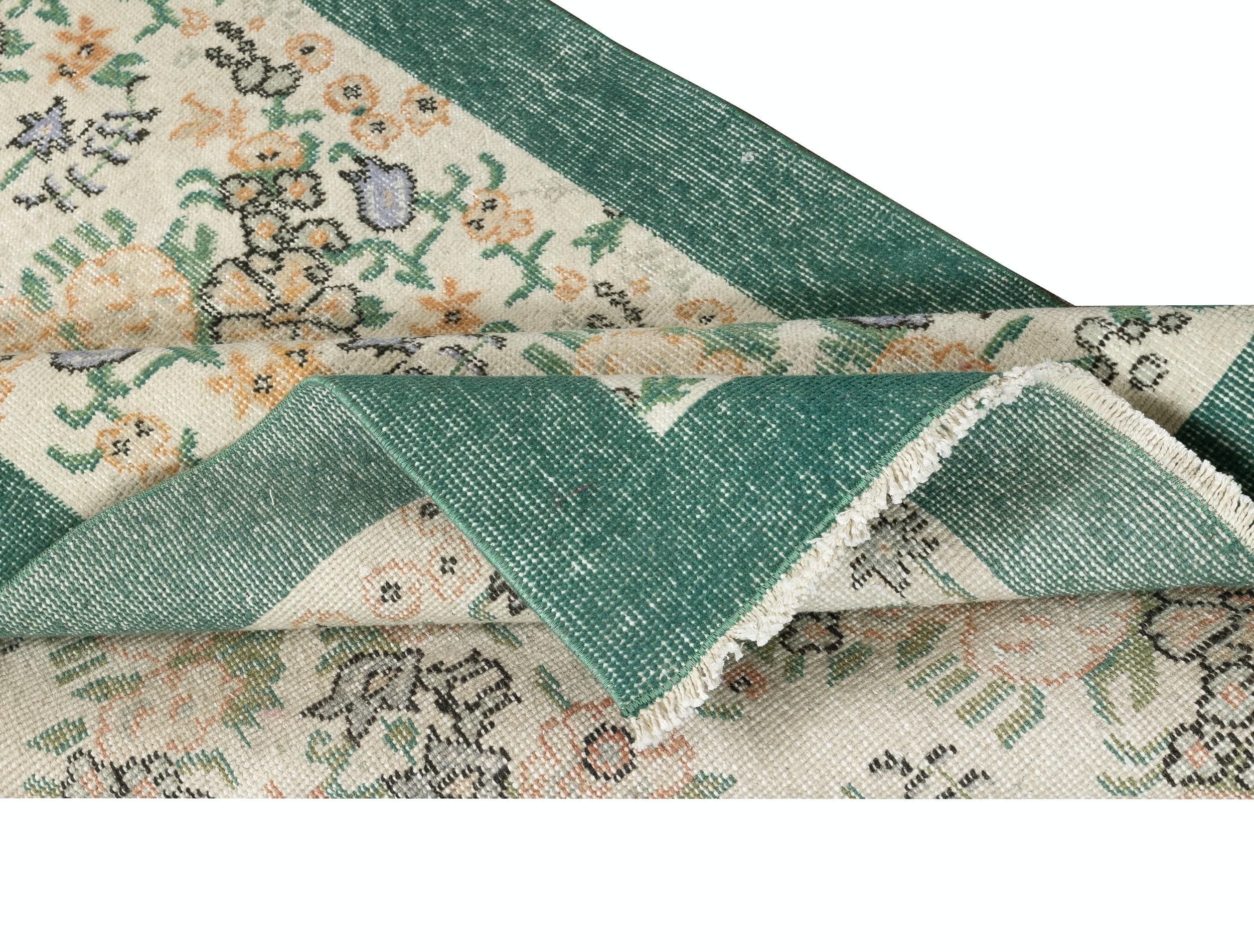 Country 3.8x6.6 Ft Vintage Handmade Turkish Rug with Floral Design & Solid Green Border For Sale