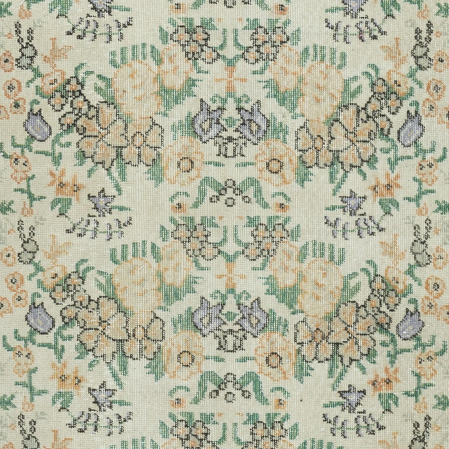 3.8x6.6 Ft Vintage Handmade Turkish Rug with Floral Design & Solid Green Border In Good Condition For Sale In Spring Valley, NY