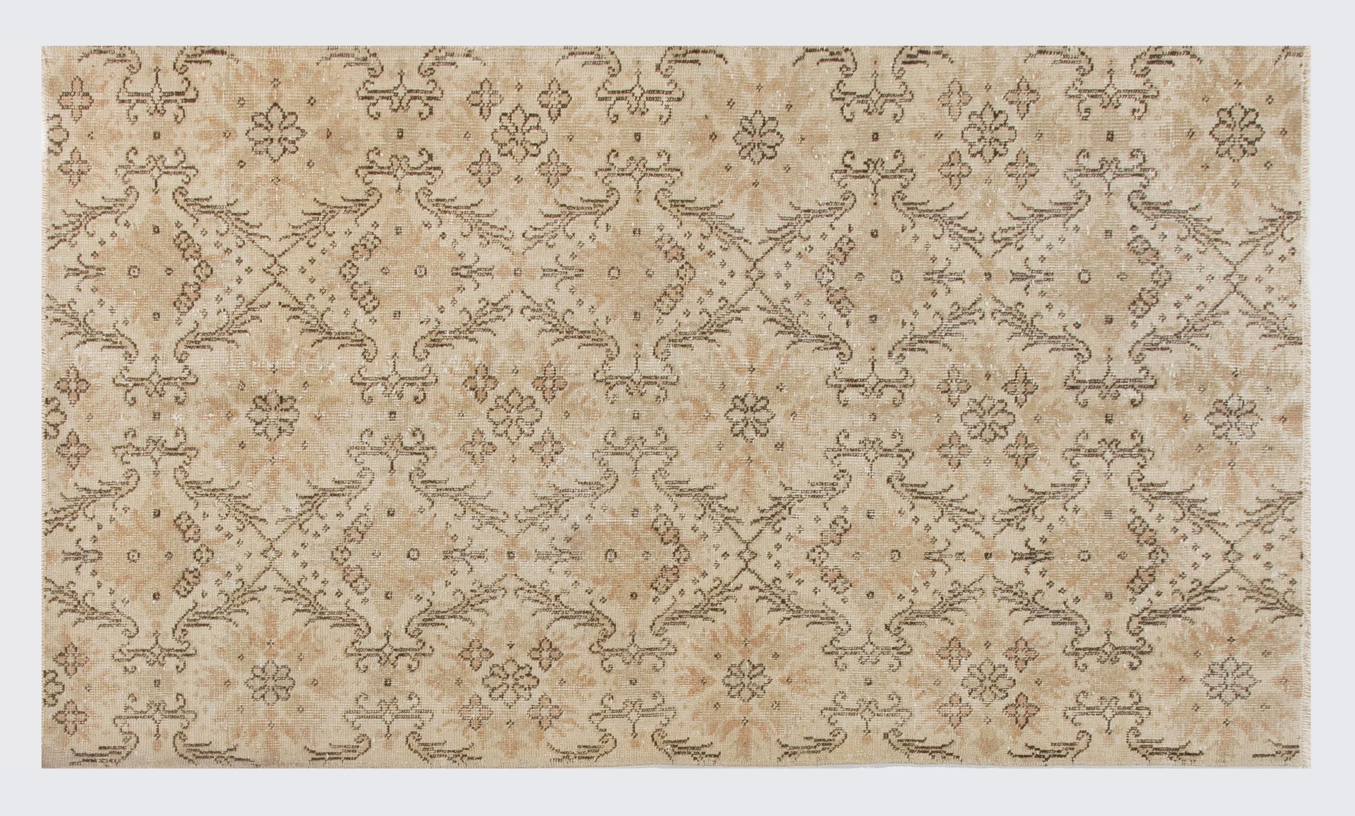 20th Century Mid-Century Hand-Knotted Turkish Rug with Floral Design, Soft Colors For Sale
