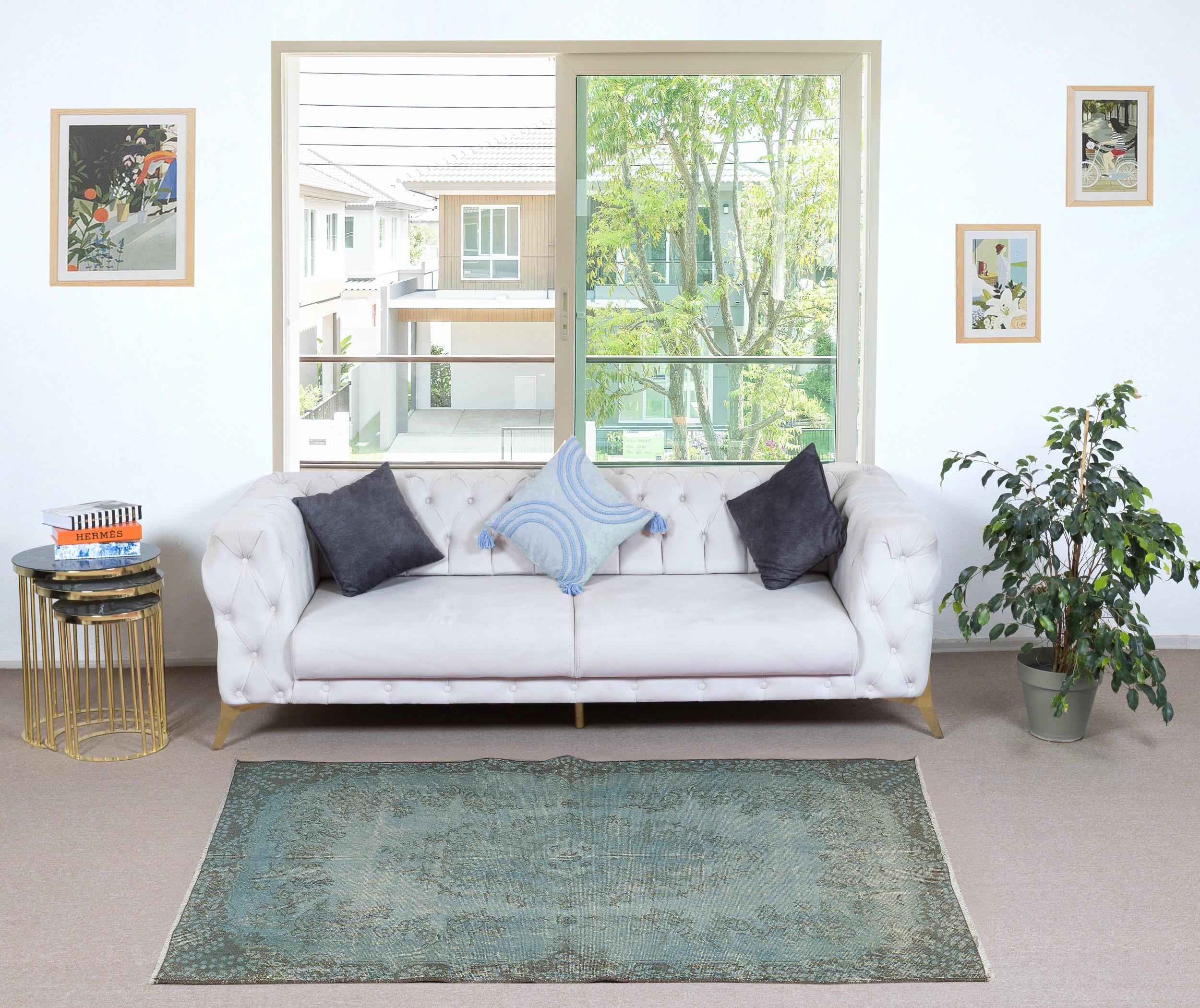 Our over-dyed rugs are all hand-knotted vintage pieces that are recreated in our workshop to cater to a wider range of interior design choices from modern to coastal, from industrial to rustic/cottage. These 50 to 70 year-old rugs were hand-knotted
