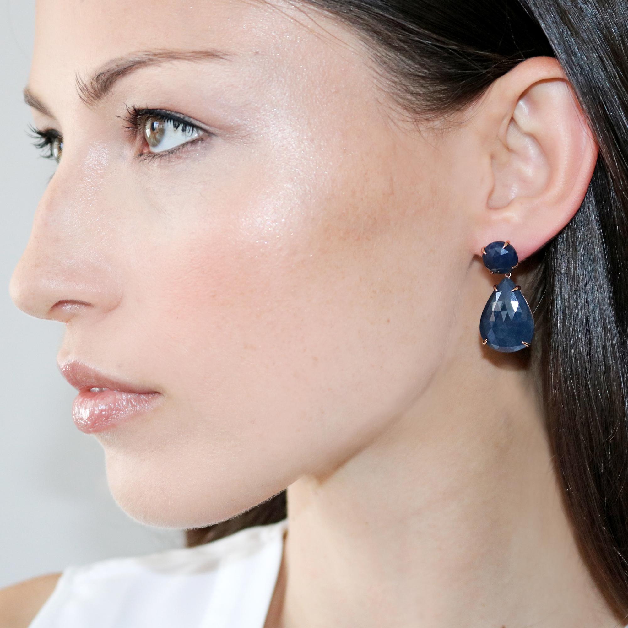 One of a kind round cut blue sapphire earrings with pear shaped blue sapphire pendants set in 18kt rose gold. Very comfortable due to their minimal weight, they are to be enjoyed for an all-day wear.

Blue Sapphire Top: 8.90 carats
Blue Sapphire