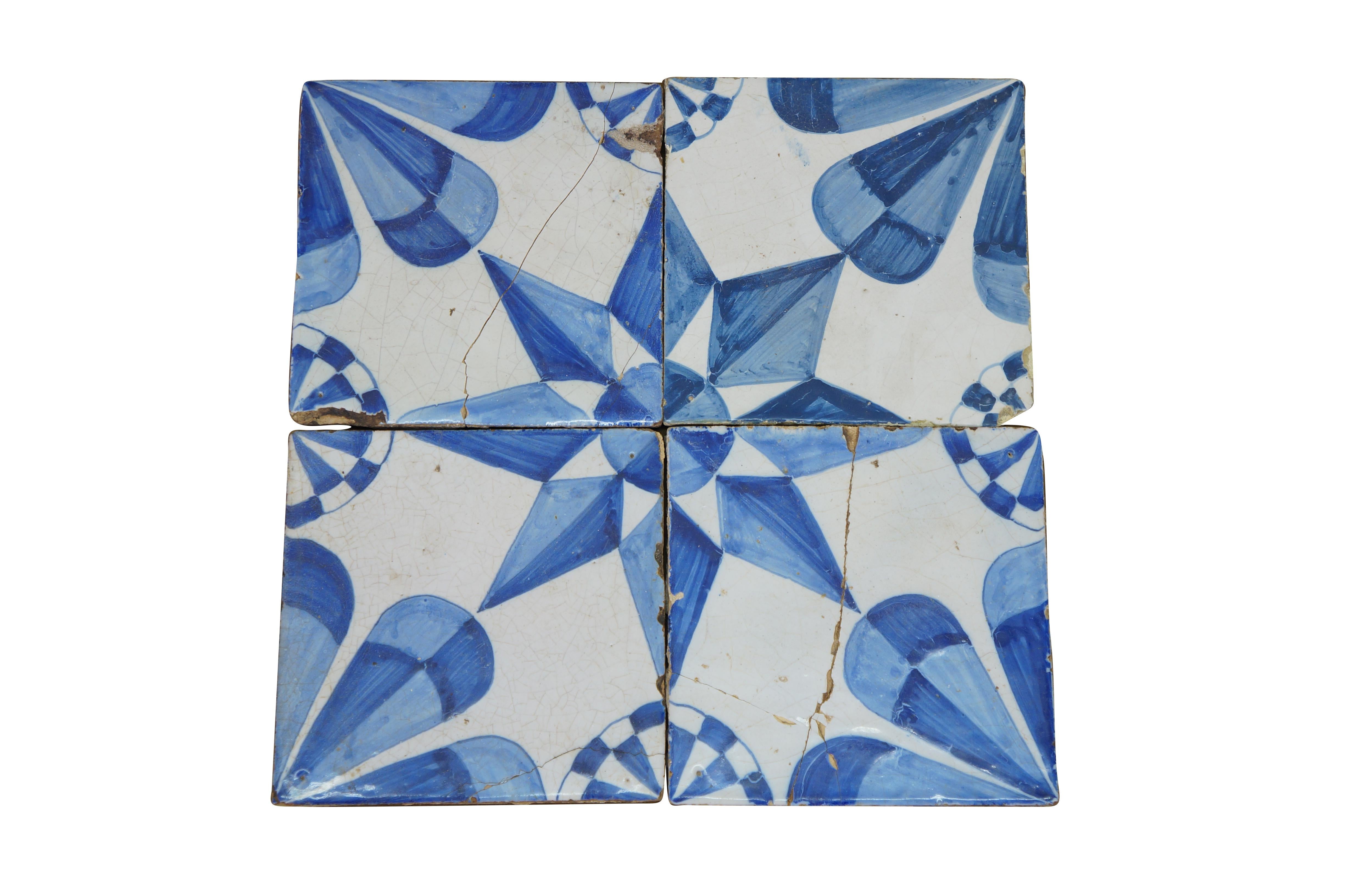 Lot of 39 antique 18th Century blue and white ceramic Delft tiles. The majority feature a circle design around various animals including rabbits, dogs/hounds/fox, deer/stag, horse, camels, and cows/bulls. Four are diagonally bisected in blue and