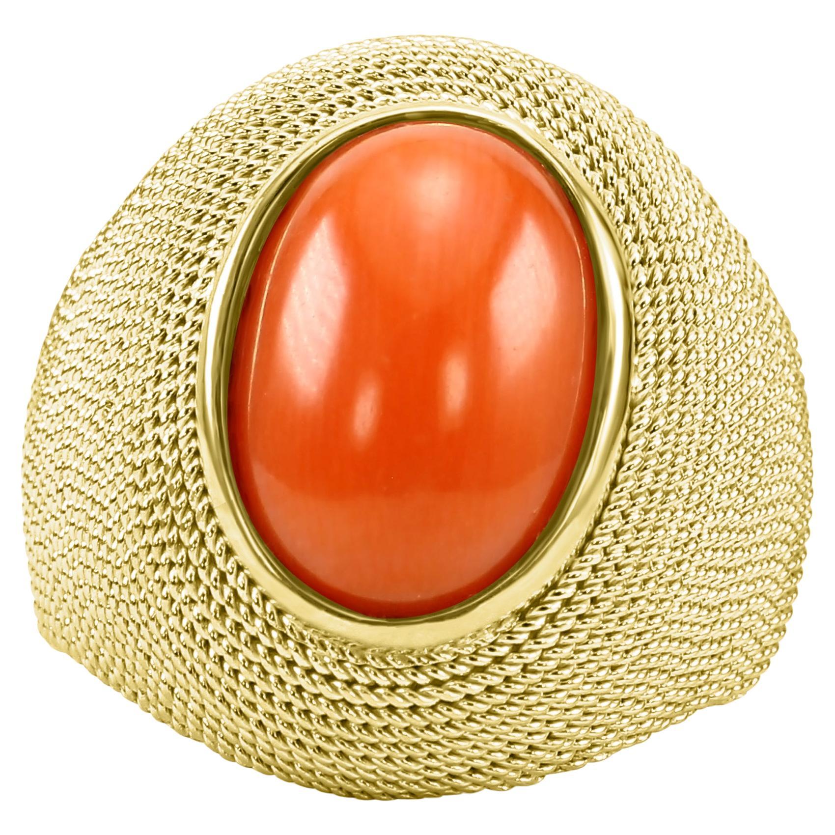 3.9 Cabochon Oval Coral 18 Karat Yellow Gold Bezel-Set Woven-Look Fashion Ring For Sale