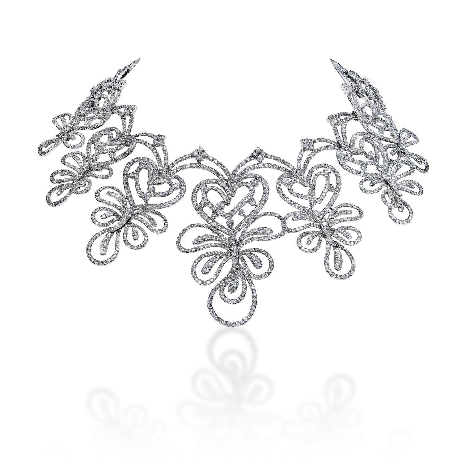 Diamond Necklace:

Carat Weight: 39.19 Carats
Shape: Round Brilliant Cut
Metal: 14 Karat White Gold
Style: Diamond Necklace