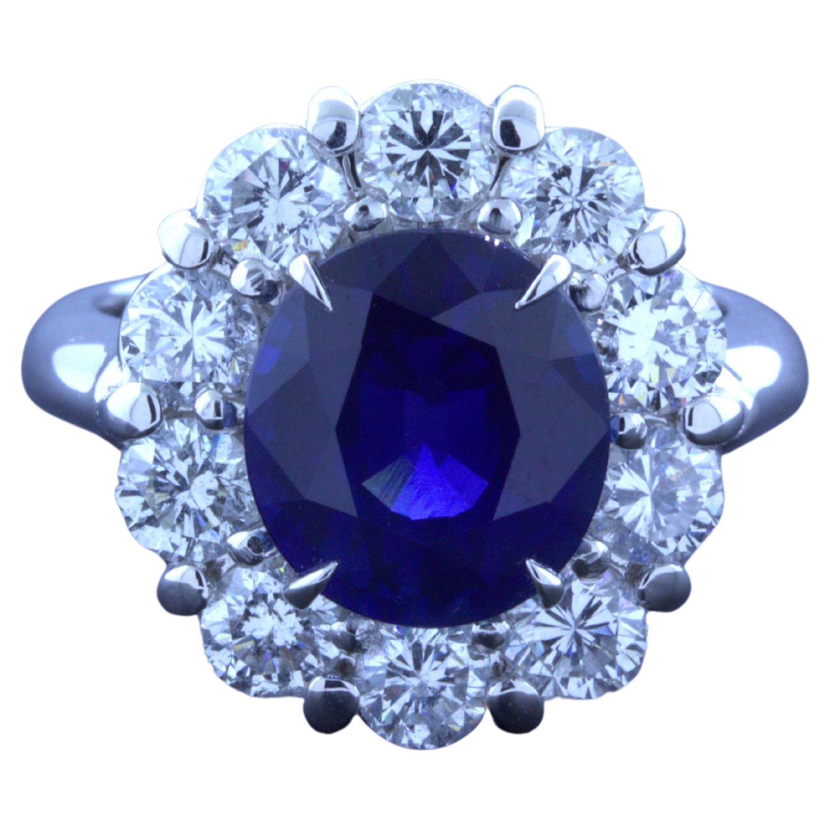 3.90 Carat Blue Sapphire Diamond Halo Platinum Ring, GIA Certified For Sale