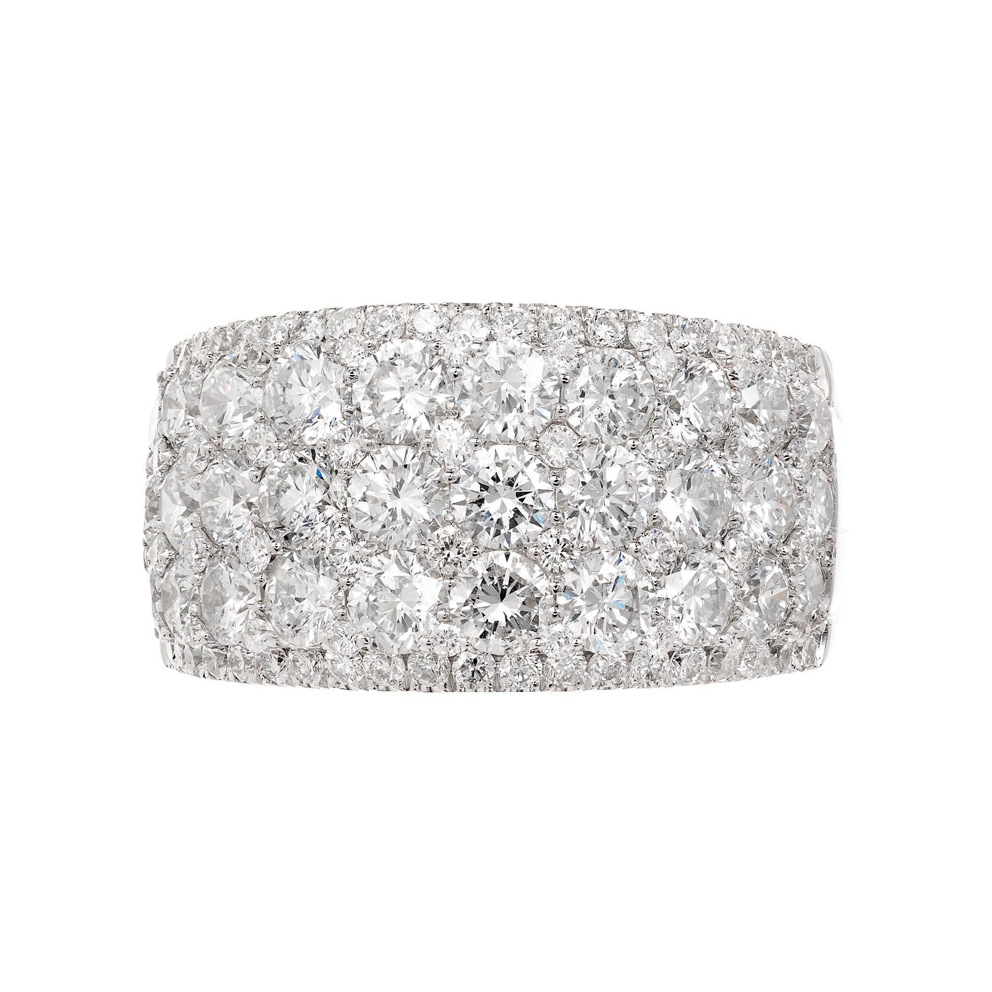 5 row 12mm wide tapered Diamond band with bright sparkly full cut Diamonds 3.90ct total defects.

110 round brilliant cut Diamonds, approx. total weight 3.90cts, F – G, VS1 – SI1
Size 7 and sizable
14k white gold
Tested and stamped: 14k
8.3