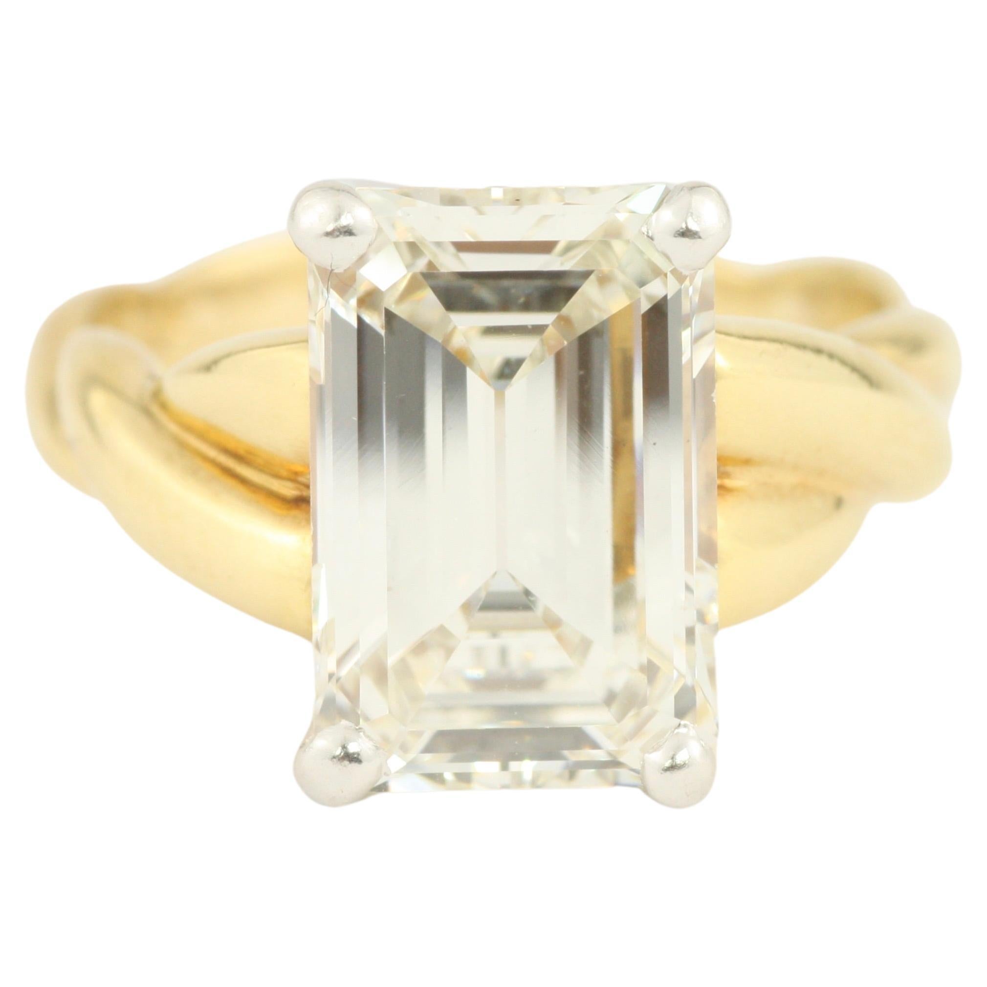3.90 Carat Emerald Cut Diamond 18 Karat Yellow Gold and Platinum Engagement Ring For Sale