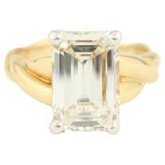 3.90 Carat Emerald Cut Diamond 18 Karat Yellow Gold and Platinum Engagement Ring