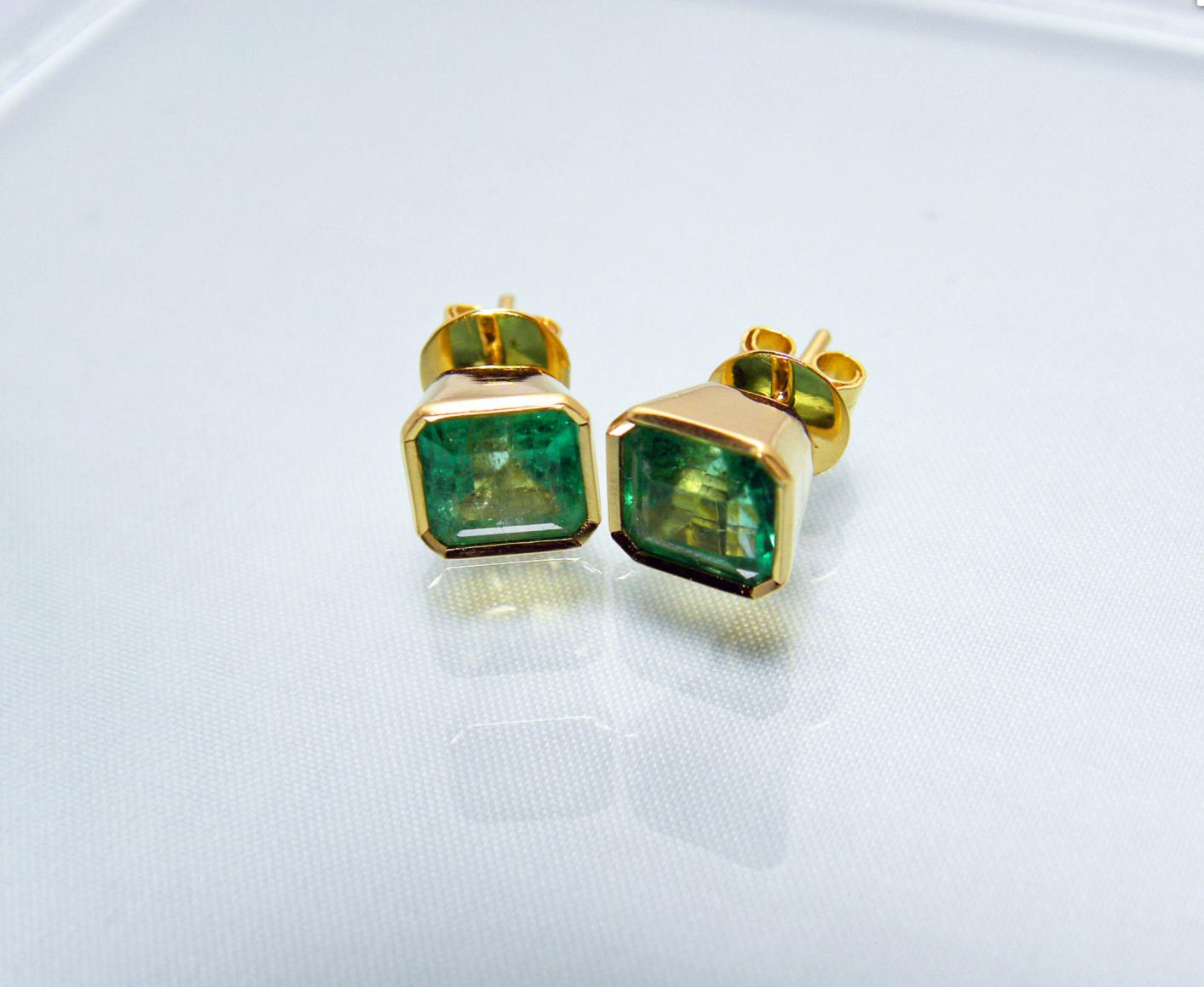 3.90 Carat Natural Green Colombian Emerald Stud Earrings 18k Gold 
Primary Stones: 100% Natural Colombian Emeralds
Shape or Cut : Emerald Cut
Average Color/Clarity : AAA Medium Green Color/ Clarity, VS
Total Weight Emeralds: 3.90 Carats 
Second