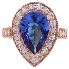 Anello con tanzanite naturale da 3,90 carati e diamante in oro rosa massiccio da 14 carati