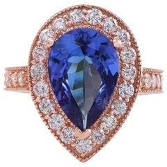 Bague en or rose massif 14 carats avec tanzanite naturelle de 3,90 carats et diamants