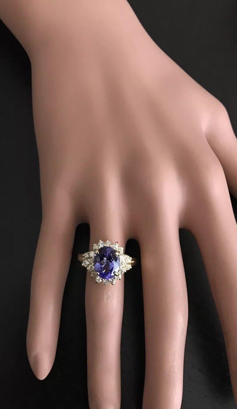 Women's 3.90 Carat Natural Very Nice Looking Tanzanite and Diamond 14 Karat Solid Yellow For Sale