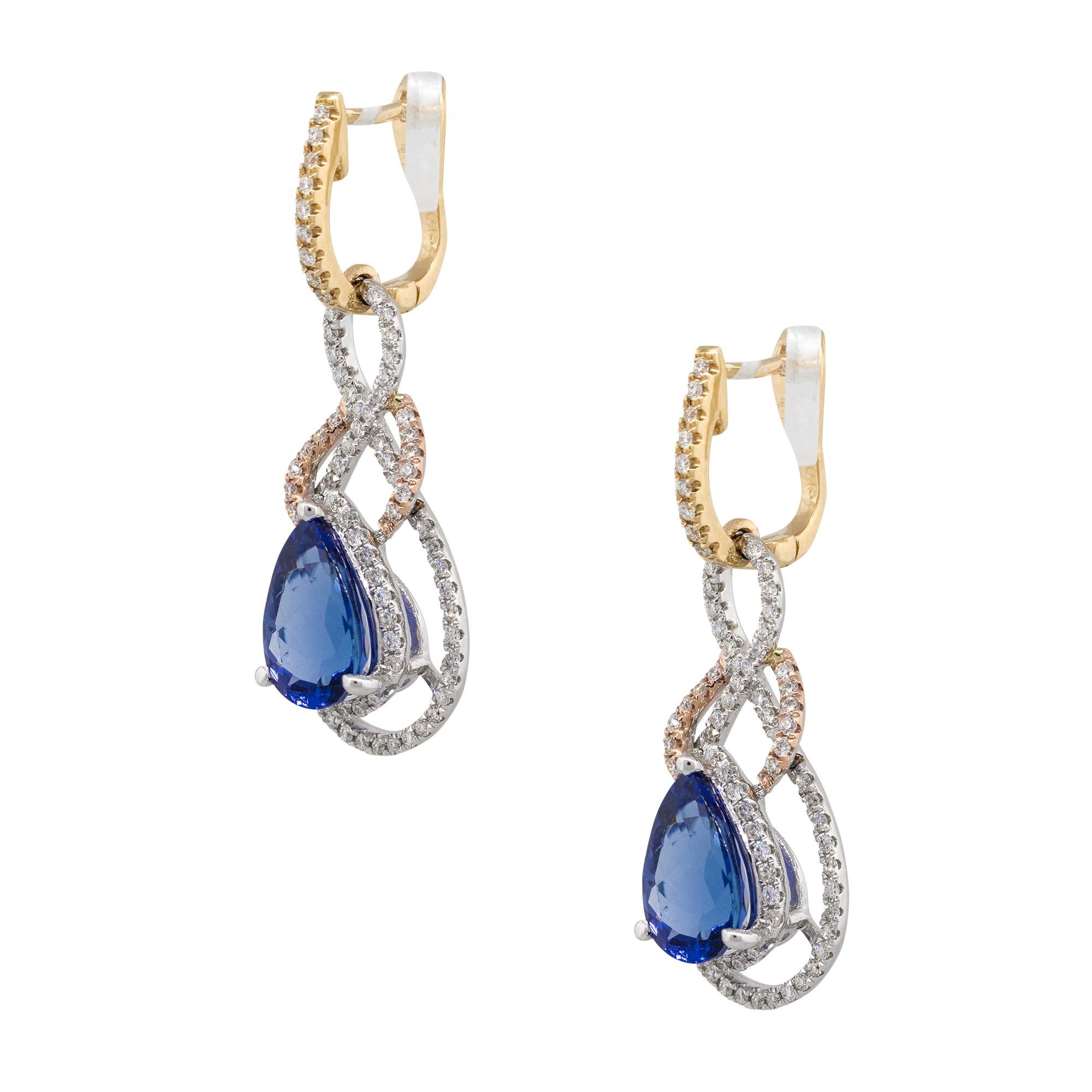 Material: 14k White gold & Rose gold
Style: Tanzanite Diamond Drop Earrings
Diamond Details: Approx. 0.88ctw of round cut diamonds. Diamonds are G/H in color and VS in clarity
Gemstone Details: Approx. 3.90ctw pear shape Tanzanite gemstones
Earring