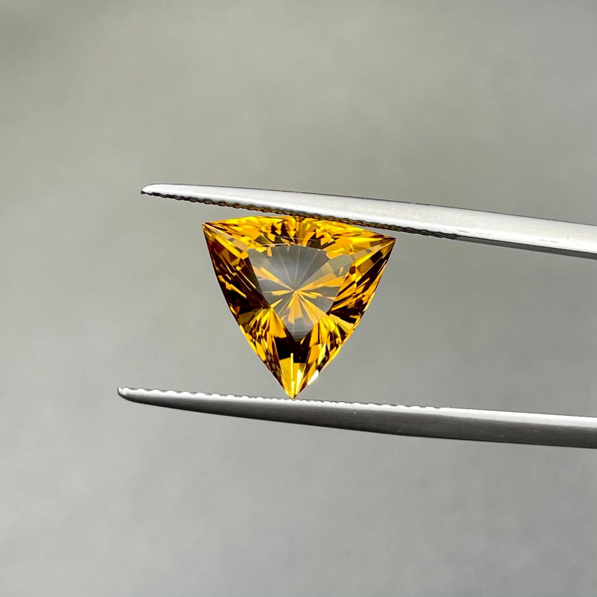 This Precisely Trillion Cut Orange Citrine was purchased from our Brazilian Source in Thailand as a rough piece of gemstone. It was brought here keeping in mind that we will cut this piece with the help of our professional gem cutters in Peshawar.