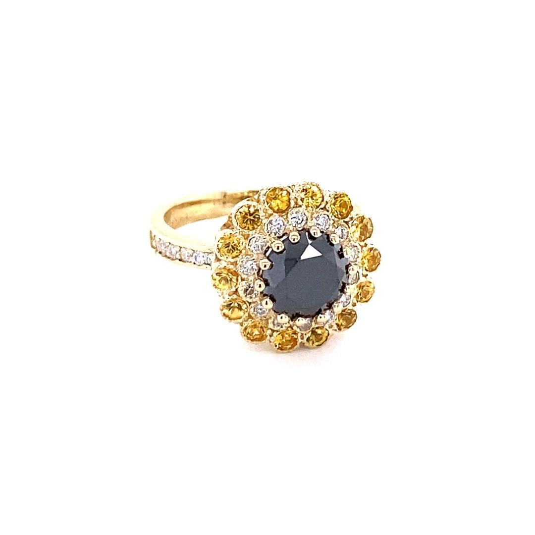 Gorgeous Black Diamond ring that can transform into an Engagement ring.  

There is a 2.69 Carat Round Cut Black Diamond in the center on the ring which is surrounded by 26 White Round Cut Diamonds that weigh 0.41 Carats (Clarity: SI2, Color: F) and