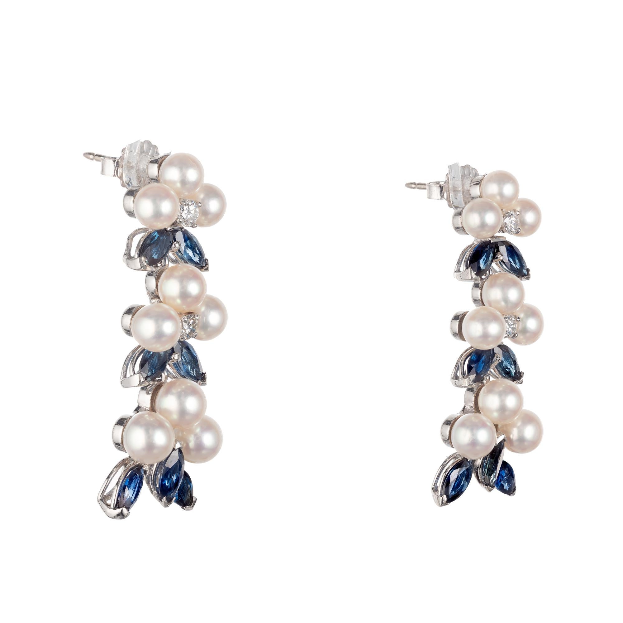  Pearl, Diamond and Sapphire dangle drop earrings. 3 flexible sections with round pearls, round diamonds and marquise sapphires. 

14 Marquise shape blue Sapphires, approx. total weight 3.50cts 
4 round brilliant cut Diamonds, approx. total weight
